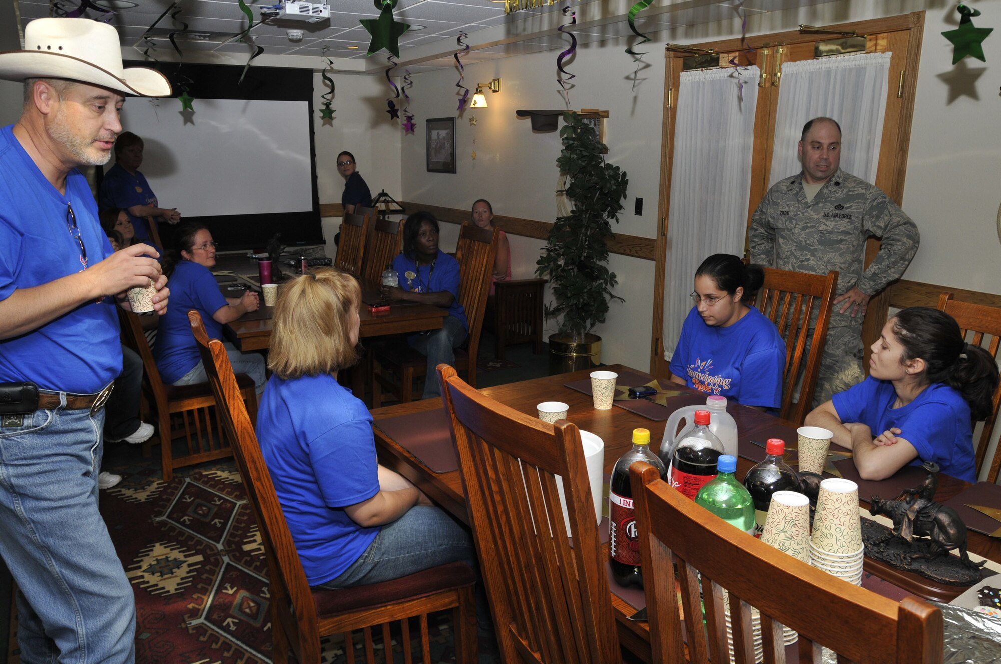 Members of the housekeeping staff from base lodging celebrate the culmination of National Housekeeping Week Sept. 20. The week included many activities and contests. (U.S. Air Force photo/John Turner)