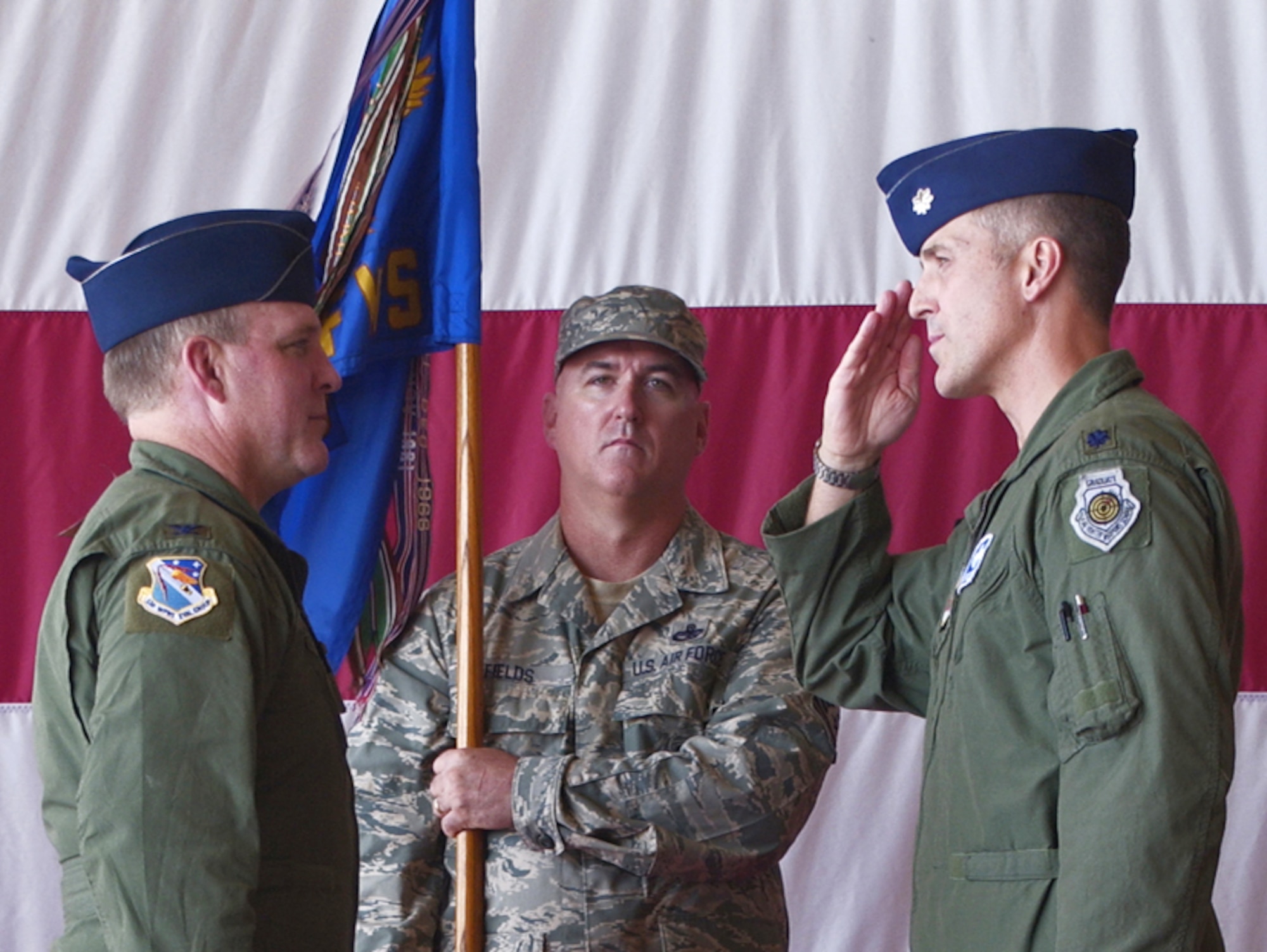 Lt. Col. Peter Ford salutes Col. Michael MacWilliams, 53d Weapons Evaluation Group commander, after taking command of the 83rd Fighter Weapons Squadron Sept. 12 at a ceremony at Tyndall Air Force Base, Fla.  The 83 FWS is responsible for the Weapon System Evaluation Program known as Combat Archer.