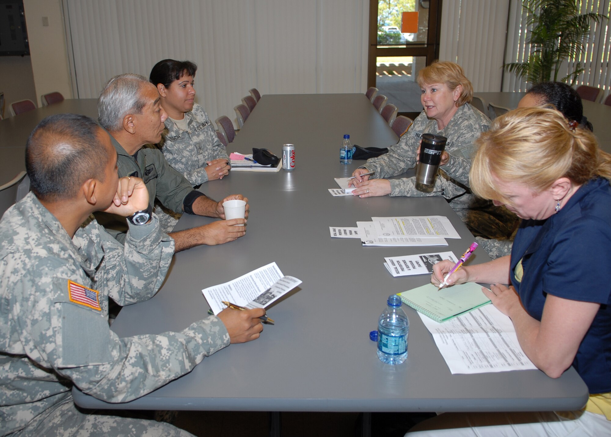 Col Jane Helton, NGB facilitates the dialog between Lt Col Oyafuso, HIANG, Maj Barbera Tucker, HIARNG, soldiers from the HIARNG and Bette Stebbins, from the Sexual Assault Prevention Response (SAPR) Office, Policy Assistance Team.  They discuss the effectiveness of policies and programs addressing the crime of sexual assault in the military that have been implemented in the Hawaii National Guard.
