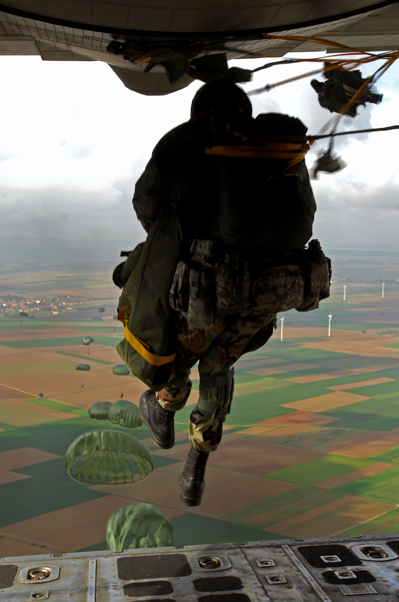 United States Air Force members from the 786th Security Forces Squadron execute an airborne jump exercise over Southwestern Germany, Sept. 24, 2008 in preparation for an up-coming mission in Bitburg. (U.S. Air Force photo by Airman Kenny Holston)(Released)