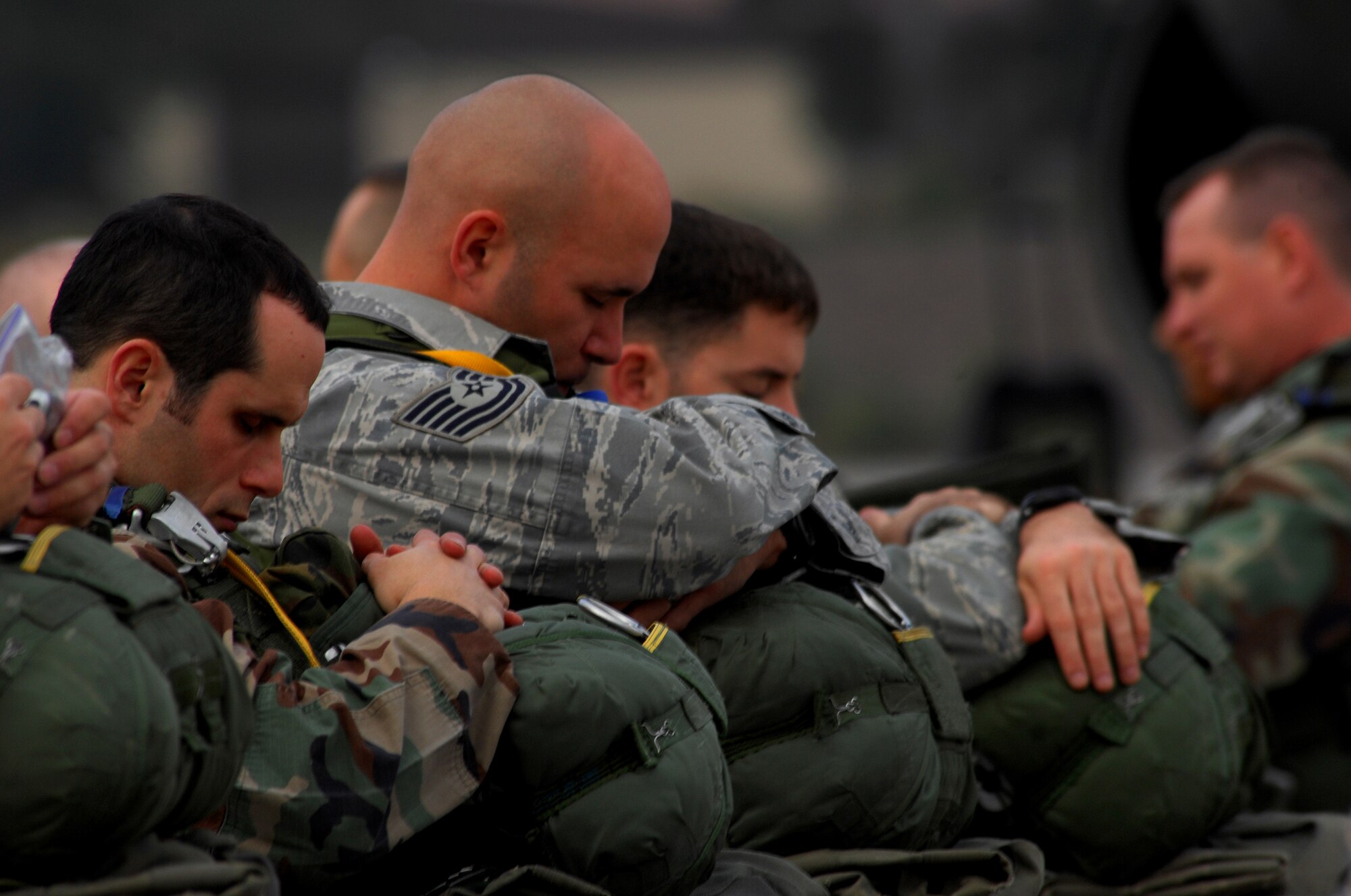 United States Air Force members from the 786th Security Forces Squadron wait to load onto a C-130 Hercules for jump training Ramstein Air Base, Germany, Sept. 24, 2008. The 786th paratroopers performed the jump in preparation for an up-coming mission in Bitburg. (U.S. Air Force photo by Airman 1st Class Kenny Holston)(Released)