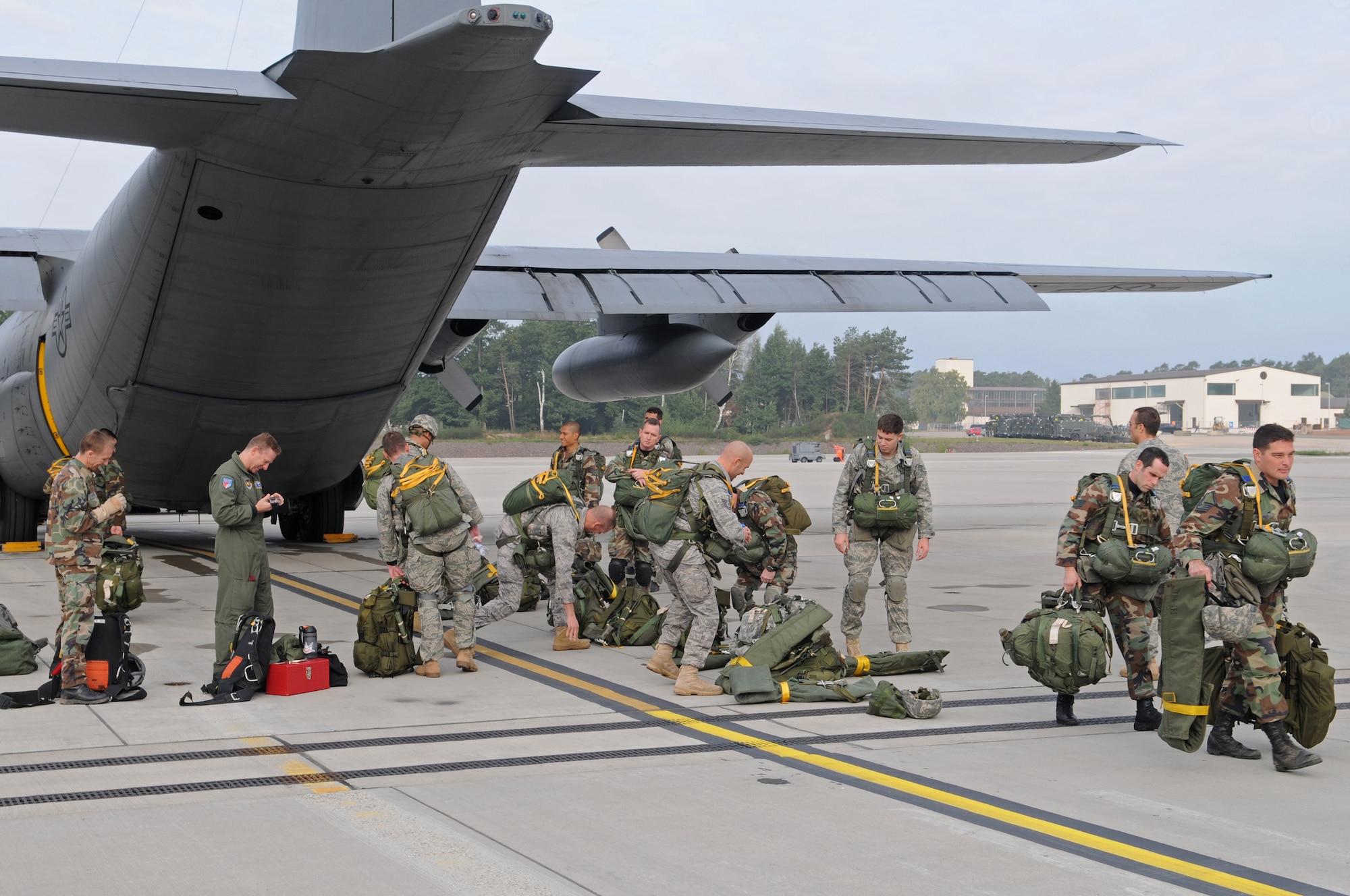 United States Air Force members, 786th Security Forces Squadron, prepare to load onto a C-130 Hercules for jump training Ramstein Air Base, Germany, Sept. 24, 2008. The 786th paratroopers performed the jump in preparation for an up-coming mission in Bitburg. (U.S. Air Force photo by Airman 1st Class Grovert Fuentes)(Released)