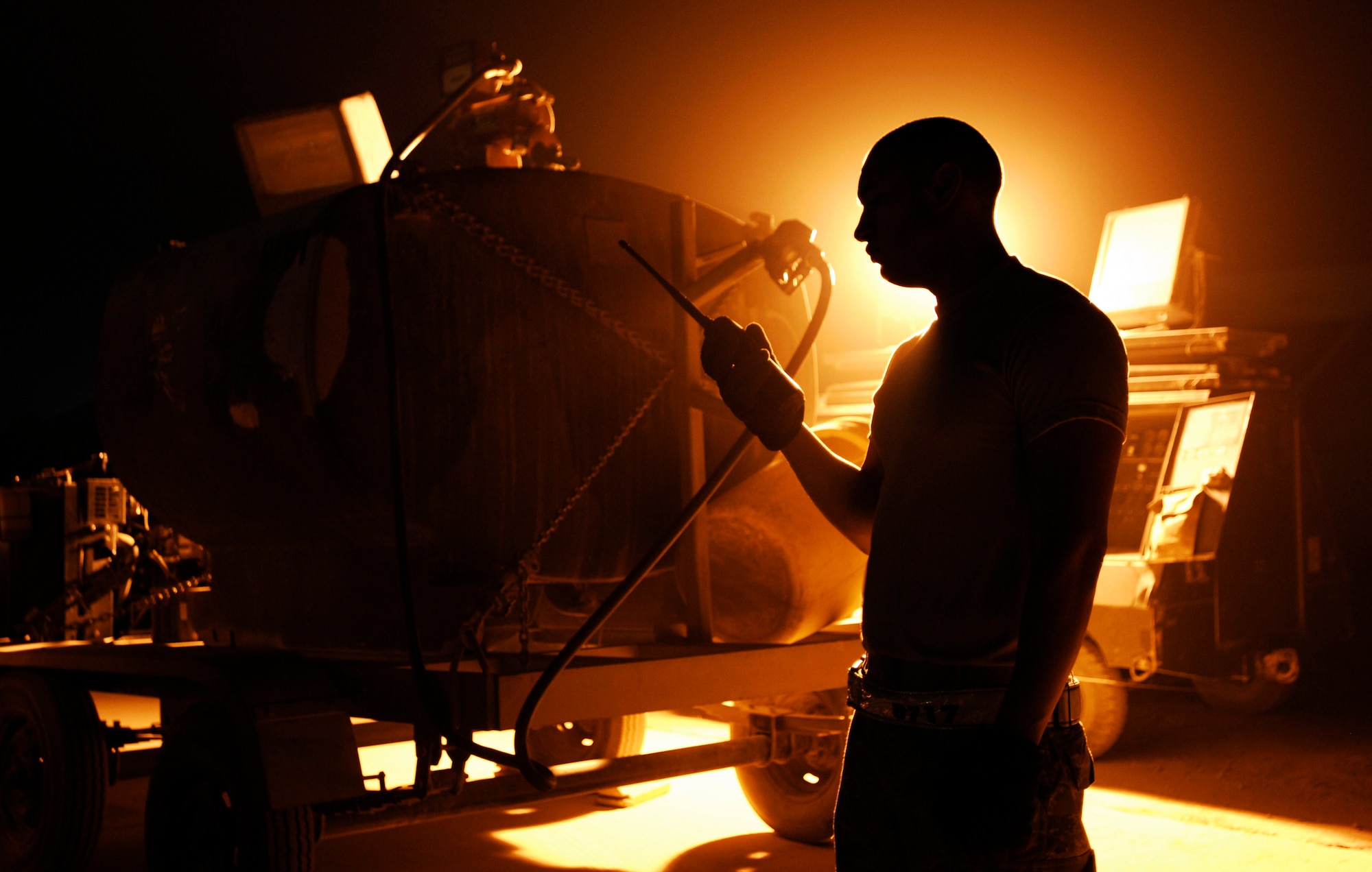 Senior Airman Fred Cruz communicates with his unit using a land mobile radio at Joint Base Balad, Iraq, Sept. 24. Airman Cruz is an aerospace ground equipment journeyman with the 332nd Expeditionary Maintenance Squadron and deployed from Shaw Air Force Base, S.C. His hometown is Sonora, Calif. (U.S. Air Force photo/Airman 1st Class Jason Epley) 
