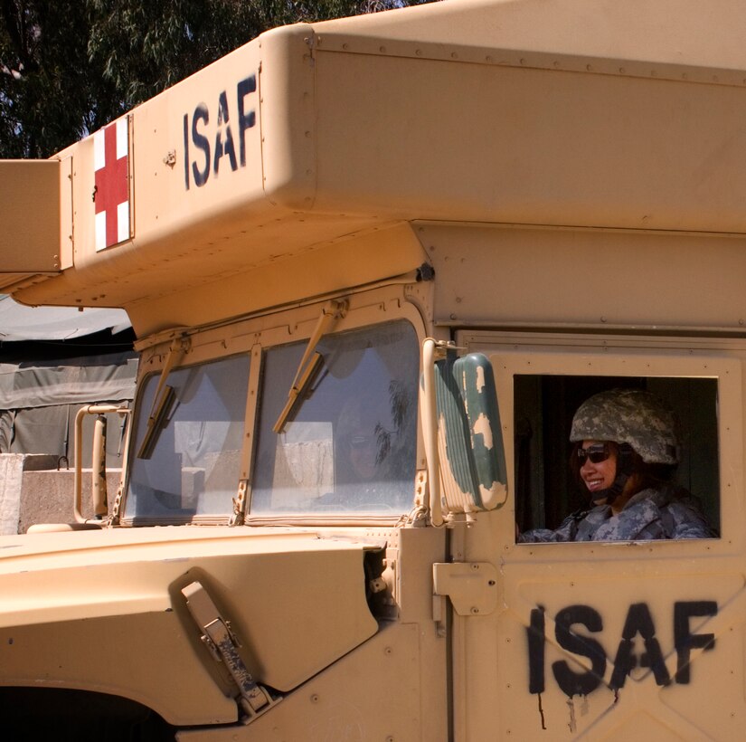 Staff Sgt. Pauline Hoyla transports local Afghans from the main gate to the hospital at Forward Operating Base Salerno, Afghanistan.
(US Air Force photo/Staff Sgt. Rachel Martinez)