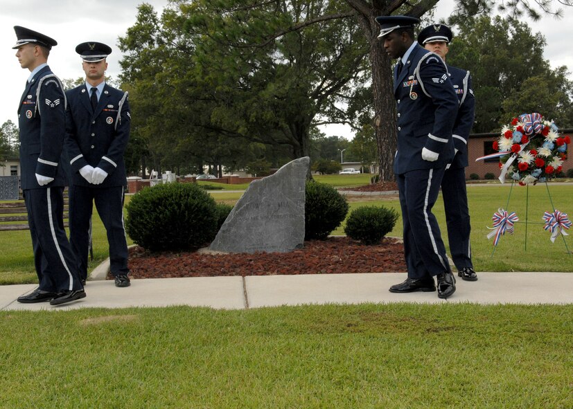 Members of the Seymour Johnson Air Force Base Honor Guard conduct the changing of the guard in front of the Prisoners of War and Missing in Action stone while participating in a 12 hour vigil during National POW/MIA Remembrance Day here on Sep. 19. The vigil concluded with a ceremony at Heritage Park. (U.S. Air Force Photo by Airman 1st Class Rae Henline)