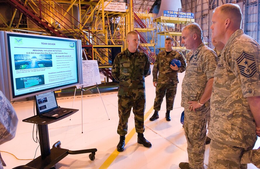 DOVER AIR FORCE BASE, Del. – (Right to left) Airman 1st Class Russell Smith, 436th Maintenance Squadron, briefs Maj. Gen. Winfield Scott III and Chief Master Sgt. James Cody, 18th Air Force commander and command chief master sergeant, about Dover’s C-5 Isochronal Inspection Dock Sept. 10. General Scott spent two days at Dover touring facilities, meeting Airmen and open Dover’s new Youth Center. (U.S. Air Force photo Jason Minto)