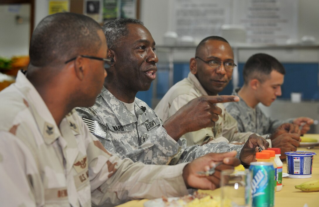 US Army General William "Kip" Ward talks to junior enlisted US military personnel during breakfast, at Camp Lemonier, Djibouti, 23 September, 2008. General Ward, Commander, United States Africa Command, visited Camp Lemonier, on the eve of AFRICOM standup. (US Air Force Photo / MSgt Stan Parker)(RELEASED)
