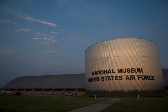 Front view of the National Museum of the U.S. Air Force in twilight.