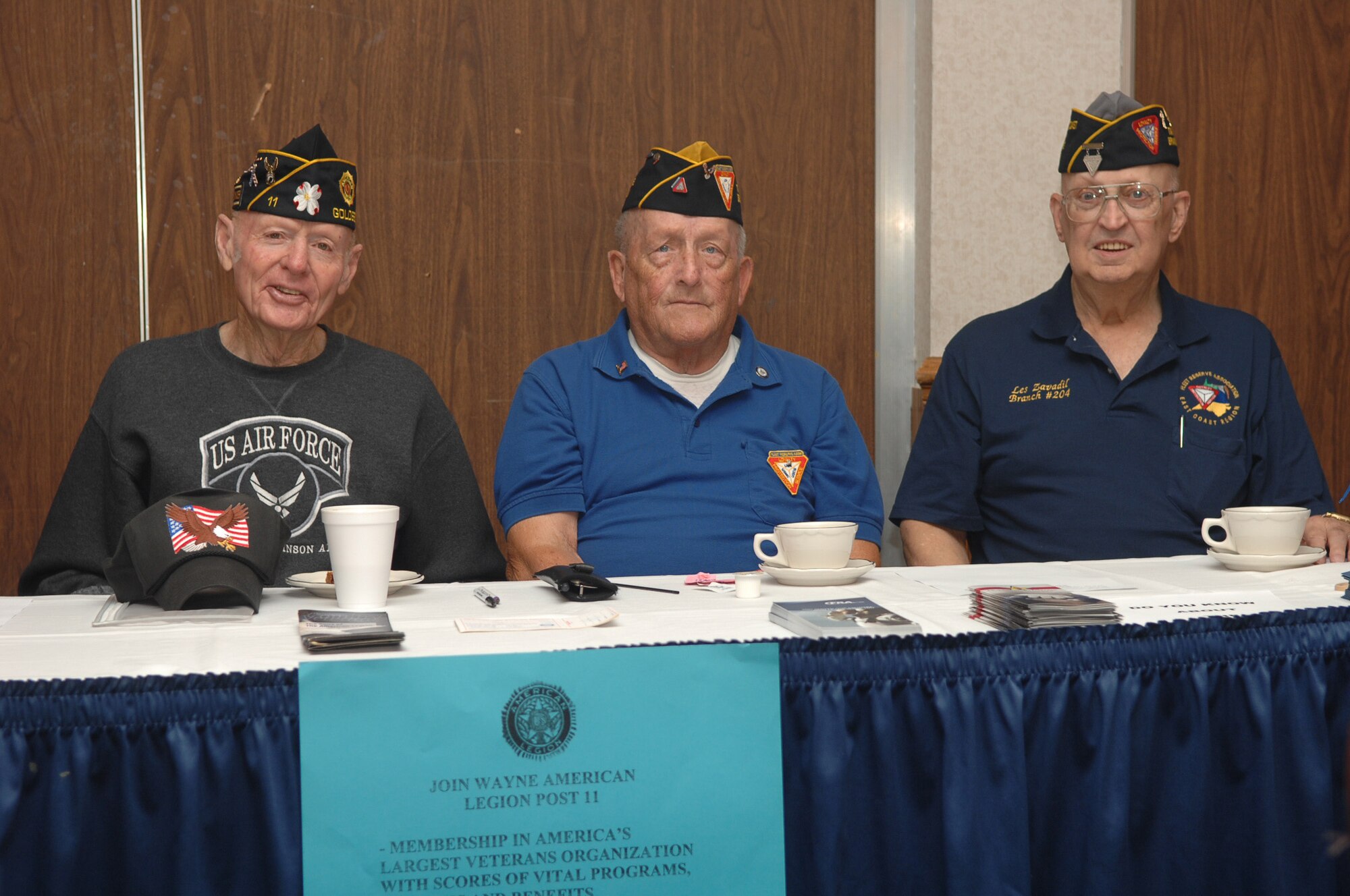 Advocates from the Wayne American Legion Post 11 await curious individuals on Retiree Appreciation Day, Sep. 20. Several veterans organizations set up informational booths for Retiree Appreciation Day on Seymour Johnson Air Force Base, N.C. (U.S. Air Force photo by Airman 1st Class Makenzie Lang)