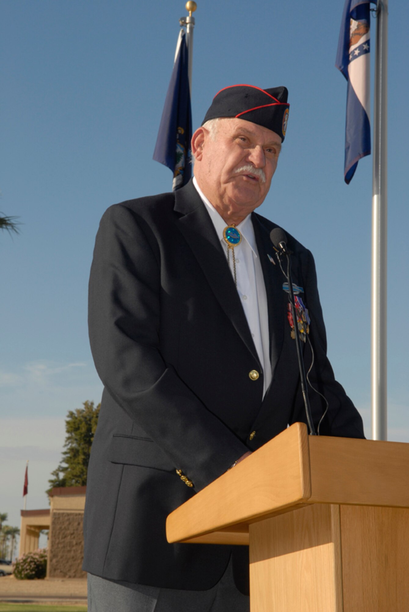 Joseph Johnson, former POW and author of Baby of Bataan, speaks to guests at the POW/MIA Recognition Day ceremony here Sept. 17. He was a Japanese POW for nearly four years before being liberated at the end of the war.