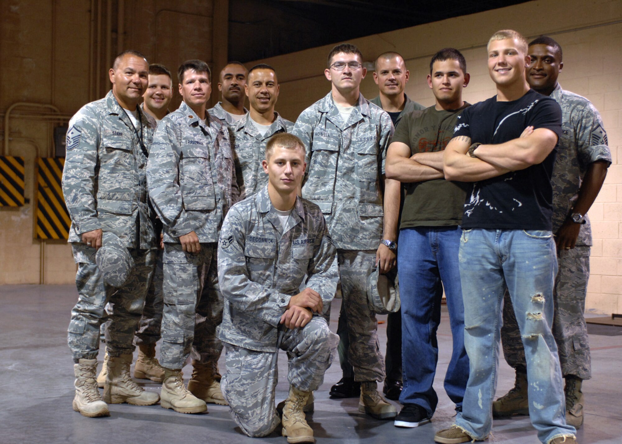 Col. Michael McGee, 49th Fighter Wing vice commander, welcomes home the 49th Materiel Maintenance Squadron Airmen in the weapons vault at Holloman Air Force Base, N.M., September 23, after they returned home from a four-month deployment. All returning warriors worked force protection during their deployment to Kirkuk, Iraq. (U.S. Air Force photo/Airman 1st Class Veronica Salgado)