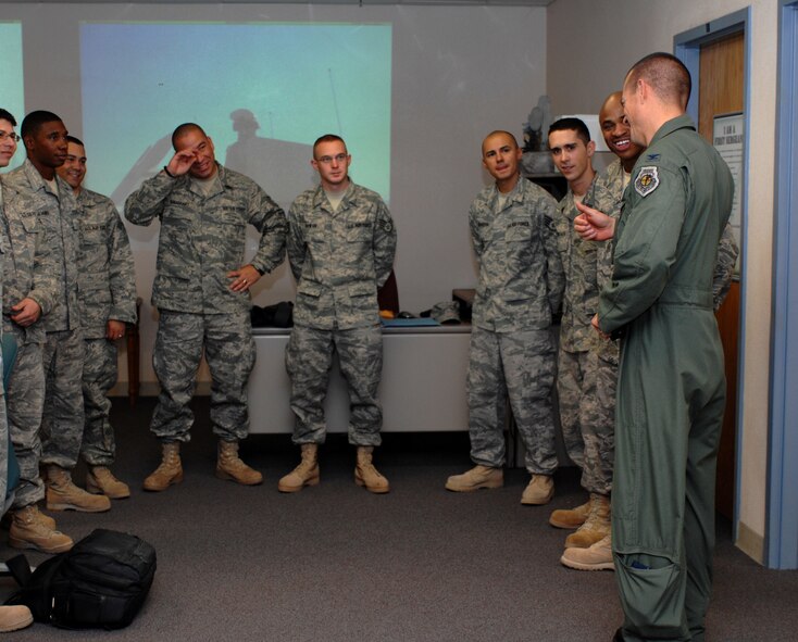Col. Michael McGee, 49th Fighter Wing vice commander, welcomes home the 49th Logistics Readiness Squadron Airmen who just returned home from an eight-month deployment to Kuwait at Holloman Air Force Base, N.M., September 23. One returning warrior, Master Sgt. Curtiss Wilson, said much of what the Airmen did during the deployment was go on combat convoys. (U.S. Air Force photo/Airman Sondra M. Escutia)