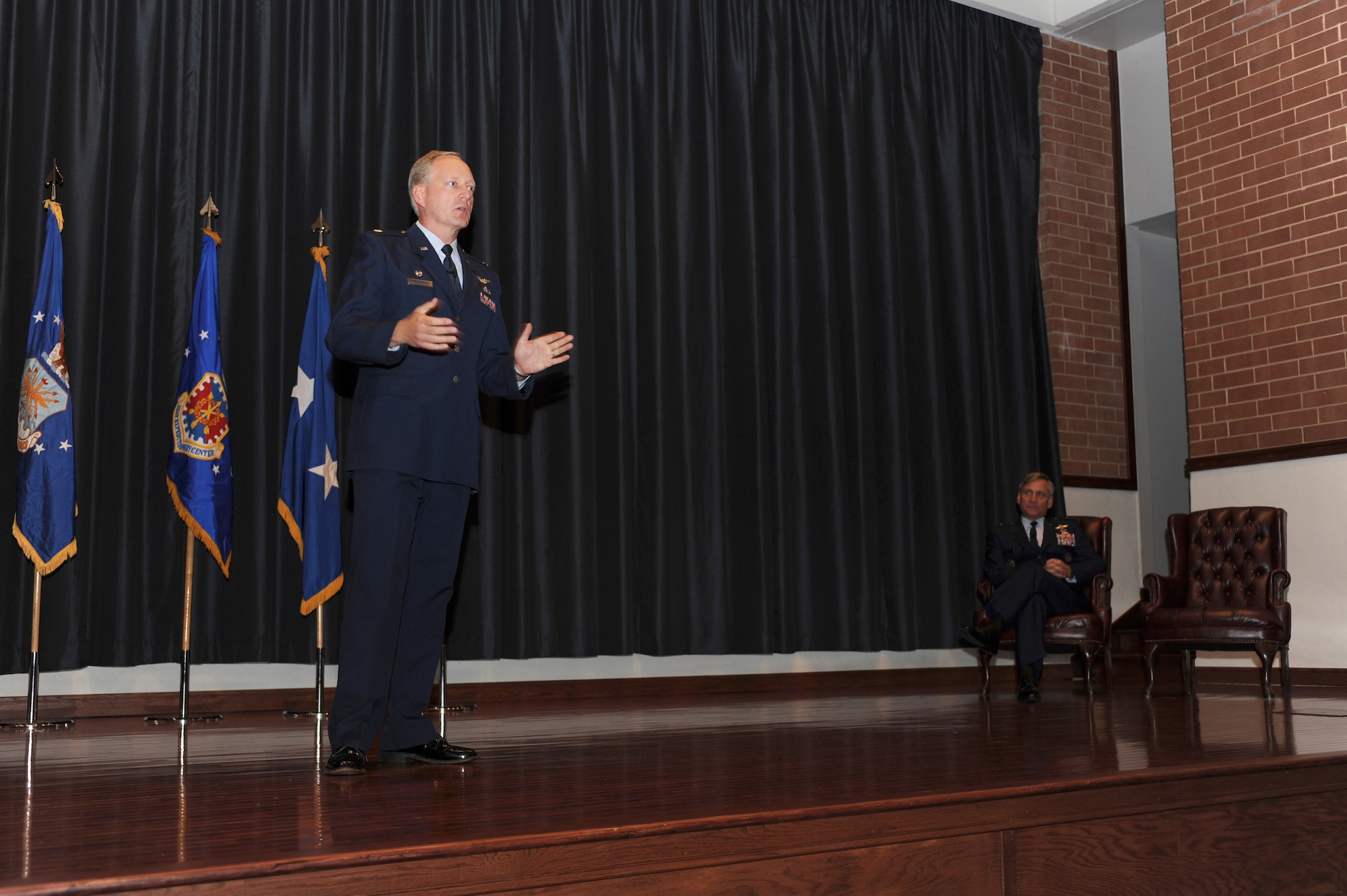 Lt. Col. Jeffrey Lathrop, the last commander of the Air Mobility Battlelab, provides remarks about the success of the unit over the 10 years of its existence during a deactivation ceremony of the battlelab in the U.S. Air Force Expeditionary Center's Grace Peterson Hall Sept. 24, 2008.  (U.S. Air Force Photo/Staff Sgt. Nathan Bevier)