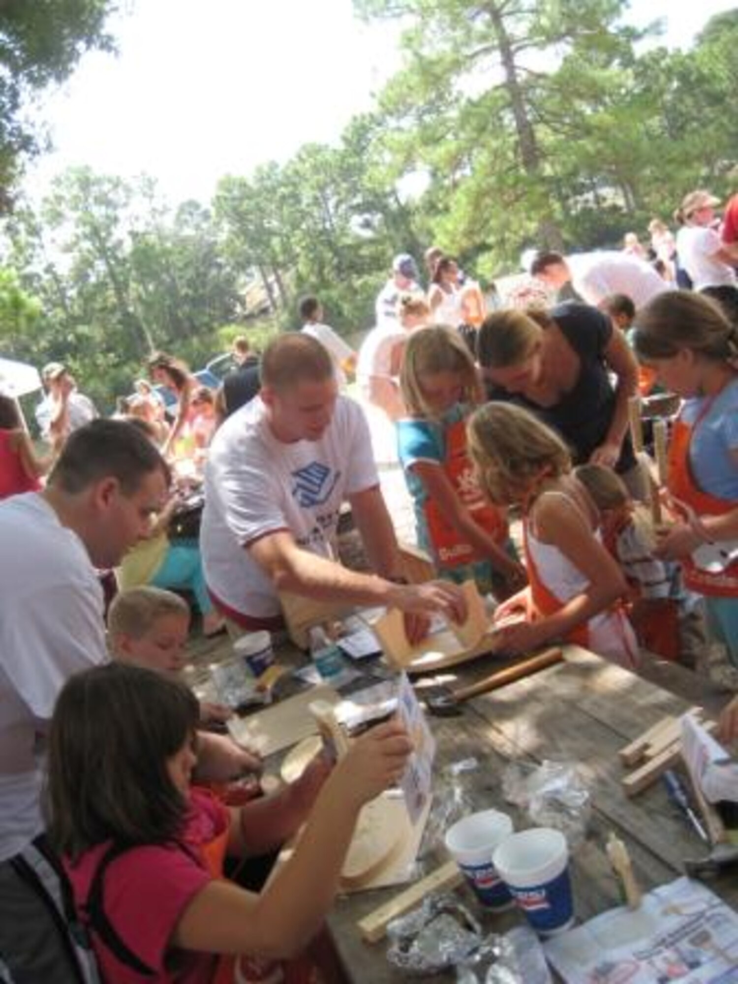 Members of the Tyndall Air Force Base Company Grade Officers Club volunteered at the Bays and Girls Club "Day for Kids" downtown Panama City Sept 22.  Over 600 families attended this year's event.  