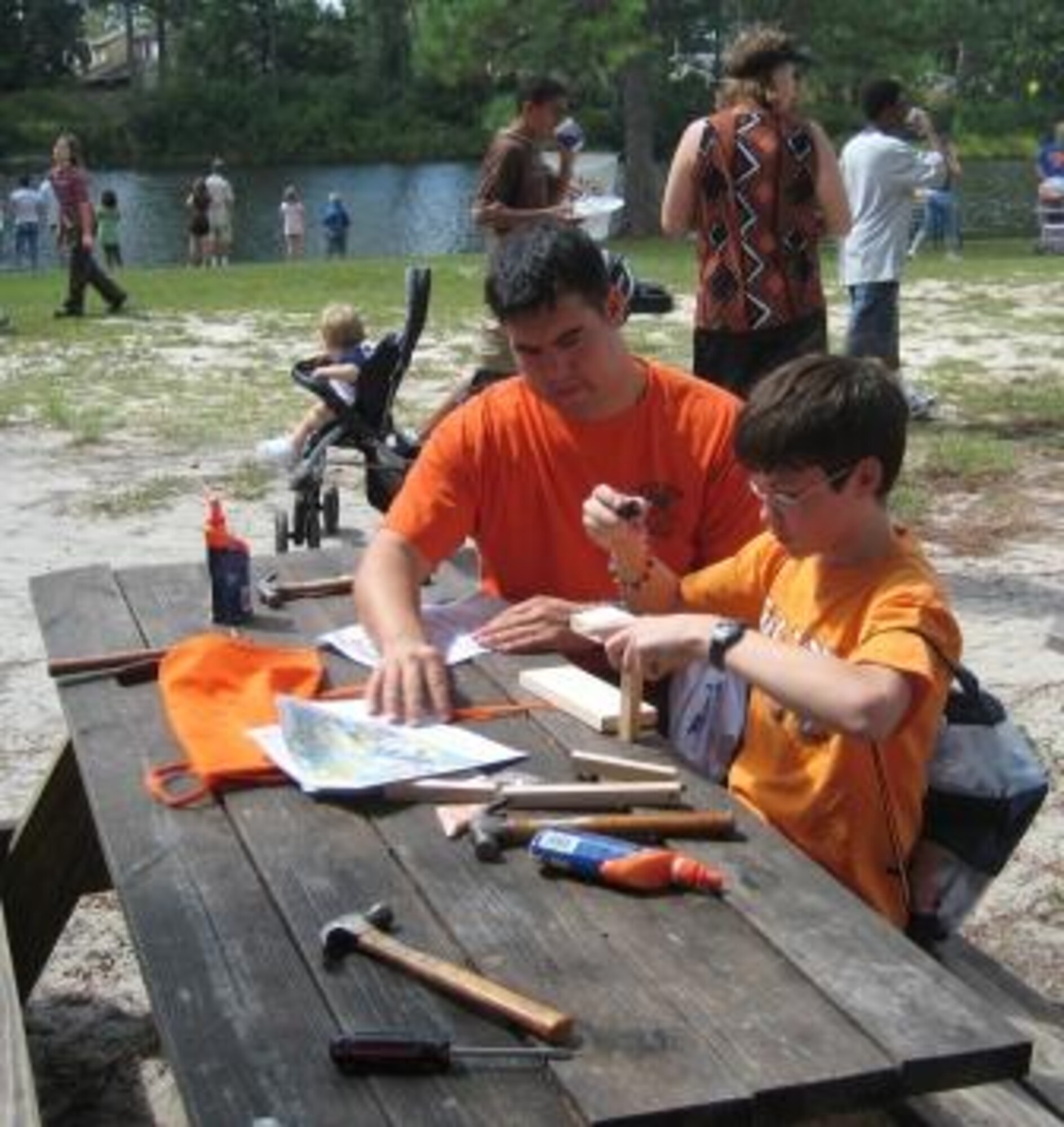 Members of the Tyndall Air Force Base Company Grade Officers Club volunteered at the Bays and Girls Club "Day for Kids" downtown Panama City Sept 22. Tyndall volunteers helped children complete Home Depot construction projects, which were meant to teach the satisfaction of starting and completing a job well done.  Over 600 families attended this year's event.  