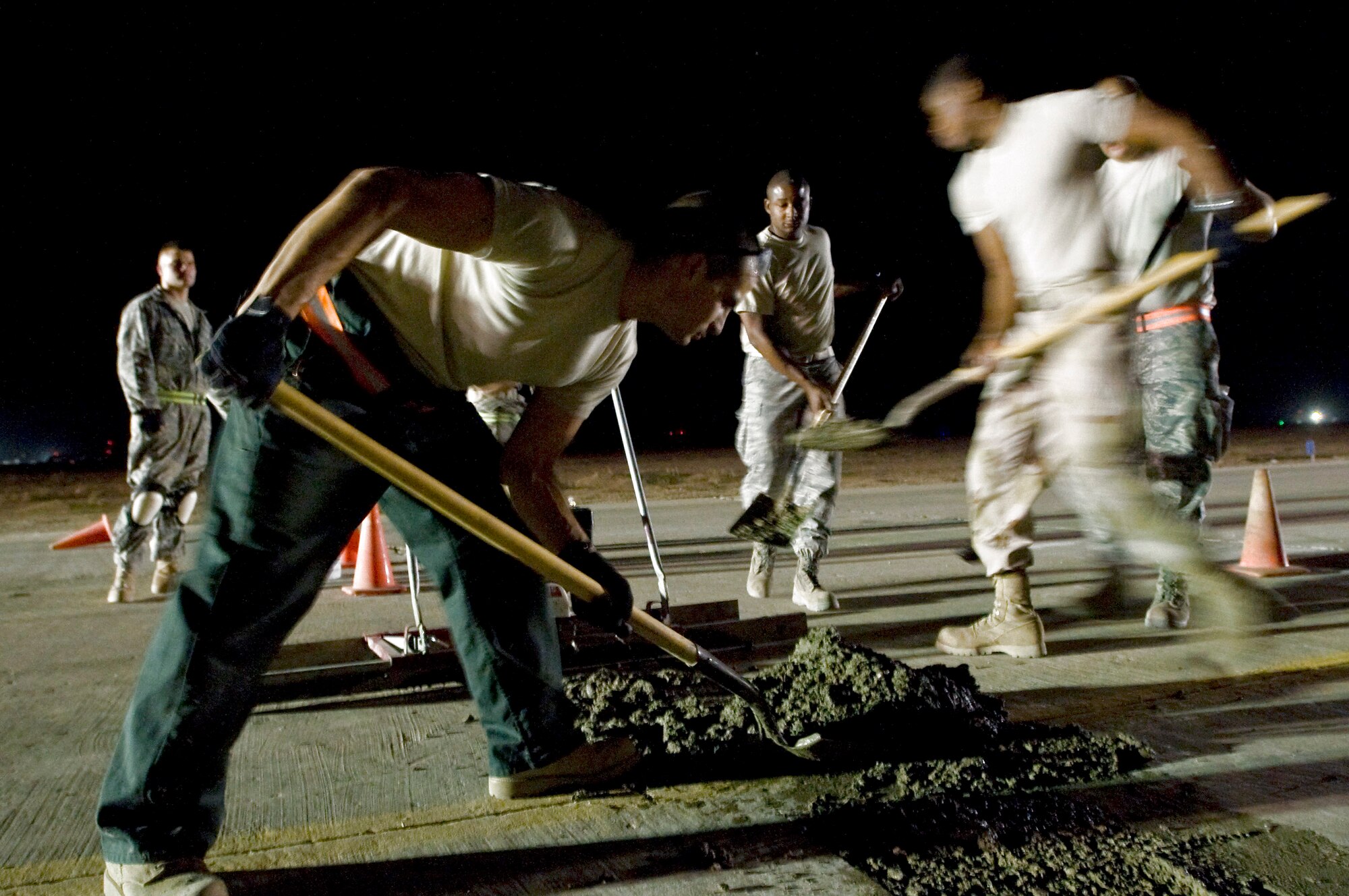 Airmen with the 407th Expeditionary Civil Engineer Squadron repair a section of runway Sept. 22 at Ali Base, Iraq. Extreme heat, along with normal wear and tear, can damage portions of the flightline, making it unsafe for aircraft. (U.S. Air Force photo/Airman 1st Class Christopher Griffin) 
