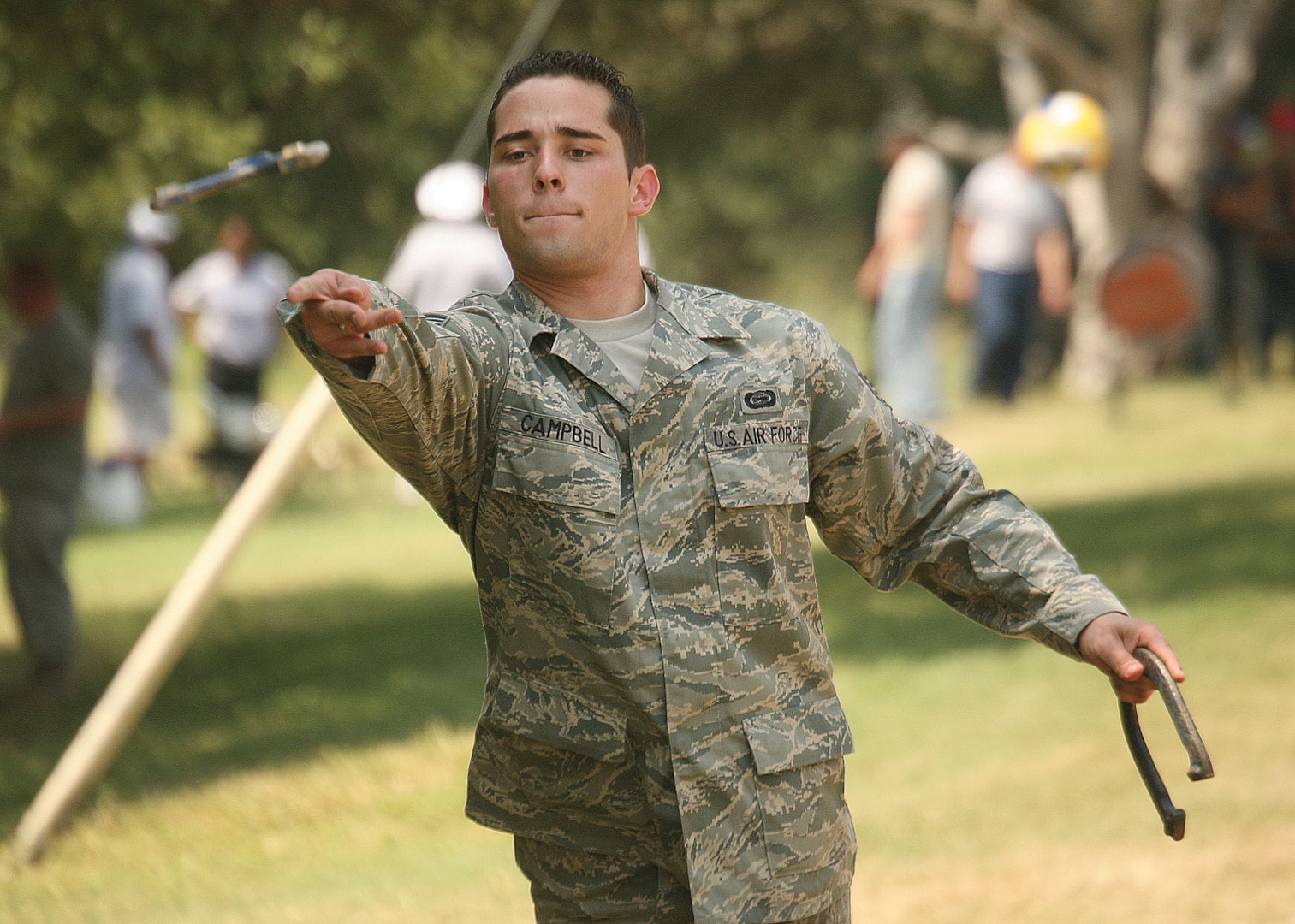 9/19/2008 - Staff Sgt. Patrick Campbell, 26th Operations Support Squadron, plays a game of horseshoes during the Junior Enlisted Appreciation Picnic. (USAF photo by Robbin Cresswell)