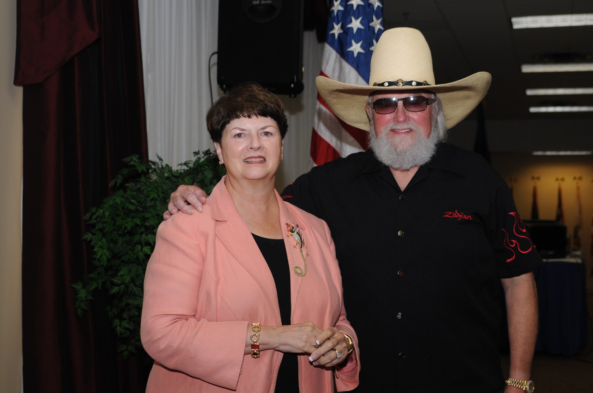 Myrtis Franke, from Senator Thad Cochran's office, poses for a photo with Charlie Daniels at a pre-concert reception where Mr. Daniels met with base leadership, local community members and several Keesler Airmen who earned Bronze Stars for their actions in Iraq.  The Charlie Daniels Band performed for Keesler Air Force Base Airmen, families and local community members Sept. 18 to help celebrate the Air Force's 61st birthday.  (U.S. Air Force photo by Kemberly Groue)

