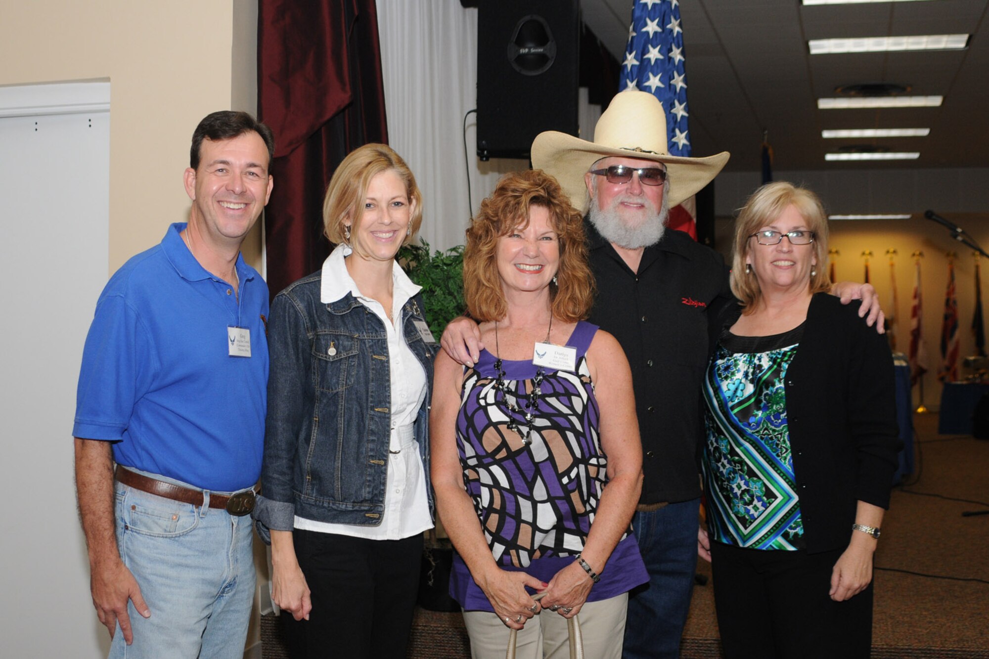 Brigadier Gen. Greg Touhill, 81st Training Wing commander, his wife Charlene and friends pose for a photo with Charlie Daniels at a pre-concert reception where Mr. Daniels met with base leadership, local community members and several Keesler Airmen who earned Bronze Stars for their actions in Iraq.  The Charlie Daniels Band performed for Keesler Air Force Base Airmen, families and local community members Sept. 18 to help celebrate the Air Force's 61st birthday.  (U.S. Air Force photo by Kemberly Groue)

