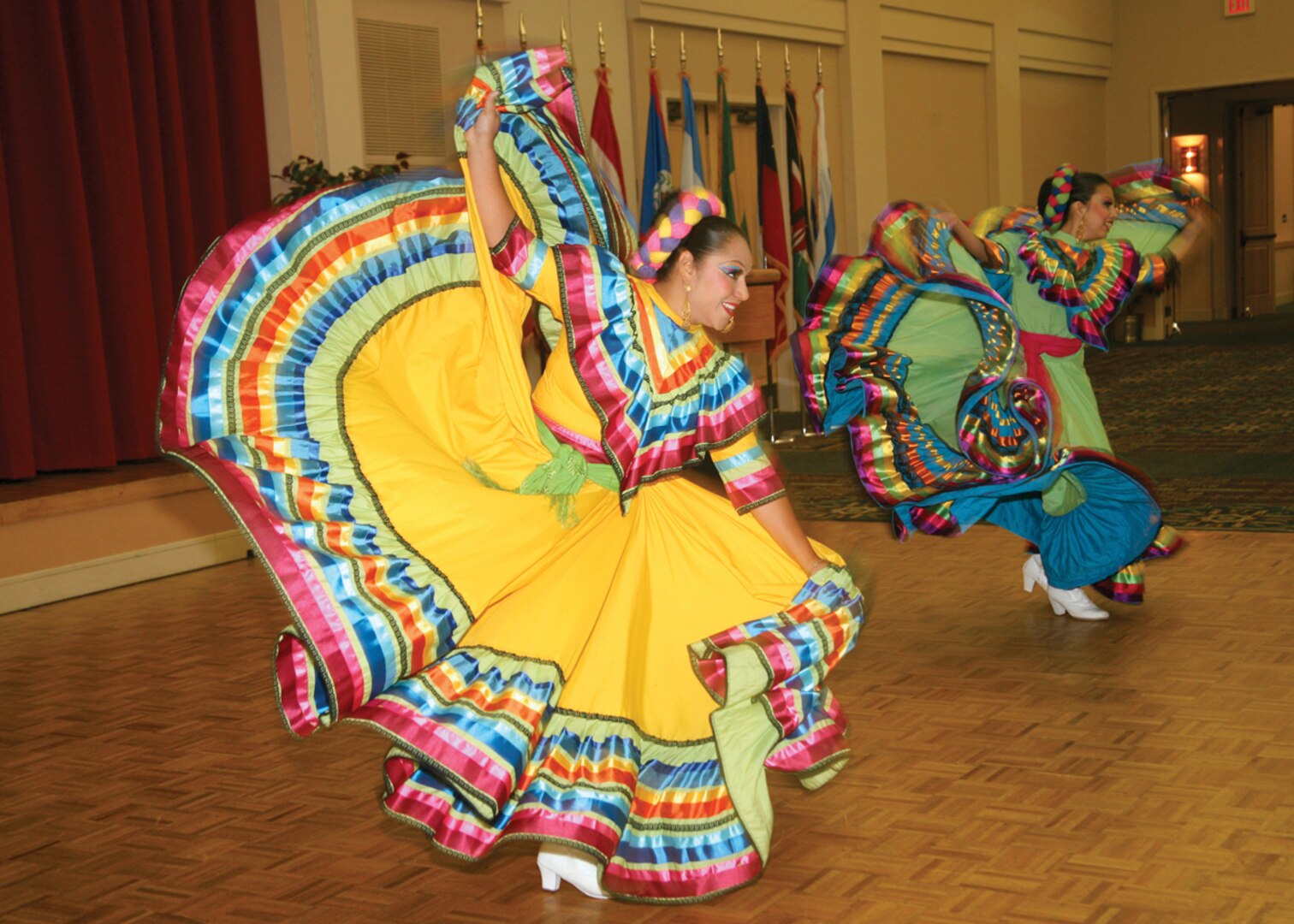 9/15/2008 - Members of the Ballet Folklorico del Cielo dance company perform during the Hispanic Heritage kickoff breakfast Sept. 15 at the Gateway Club. (USAF photo by Robbin Cresswell)