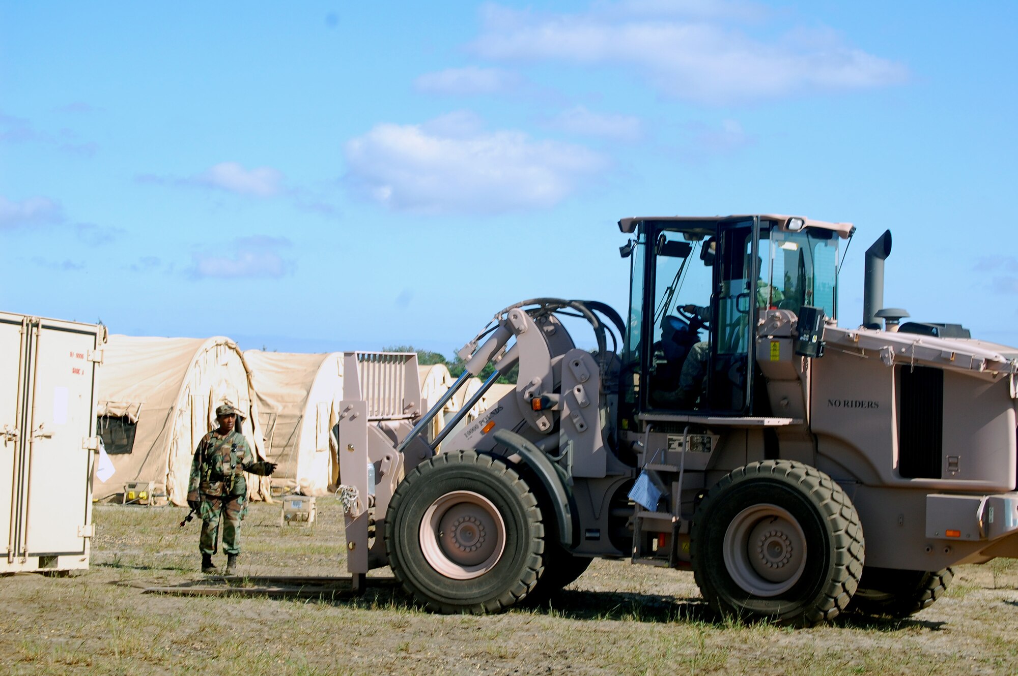 Students in Air Force Exercise Eagle Flag 08-6 use an extreme terrain forklift to move cargo as part of exercise operations Sept. 20, 2008, at Naval Air Engineering Station Lakehurst, N.J.  Eagle Flag is managed by the U.S. Air Force Expeditionary Center's 421st Combat Training Squadron at Fort Dix, N.J., and tests and trains Airmen in expeditionary combat support skills.  (U.S. Air Force Photo/Tech. Sgt. Scott T. Sturkol)