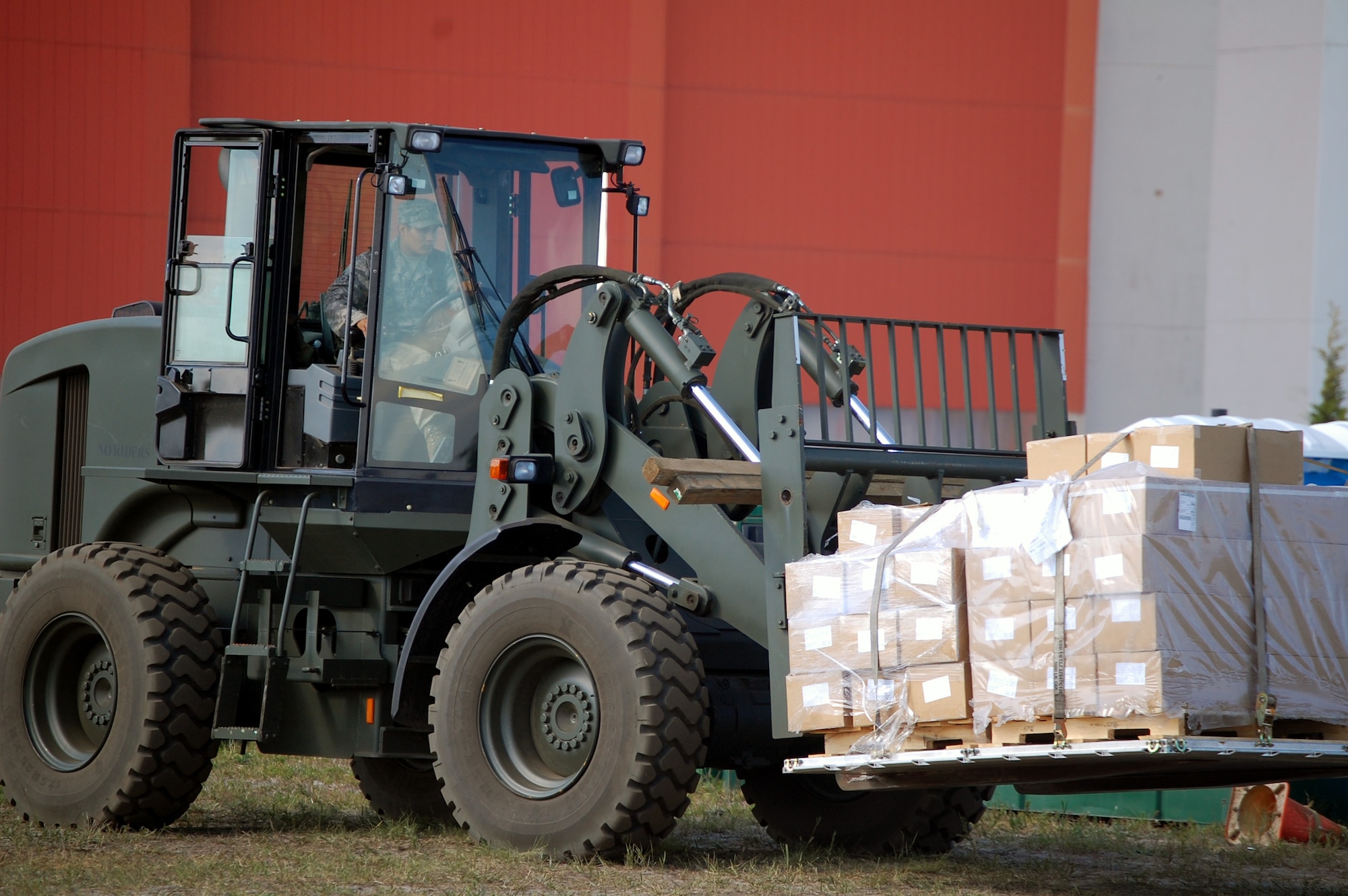 A student in Air Force Exercise Eagle Flag 08-6 uses an extreme terrain forklift to move cargo as part of exercise operations Sept. 20, 2008, at Naval Air Engineering Station Lakehurst, N.J.  Eagle Flag is managed by the U.S. Air Force Expeditionary Center's 421st Combat Training Squadron at Fort Dix, N.J., and tests and trains Airmen in expeditionary combat support skills.  (U.S. Air Force Photo/Tech. Sgt. Scott T. Sturkol)