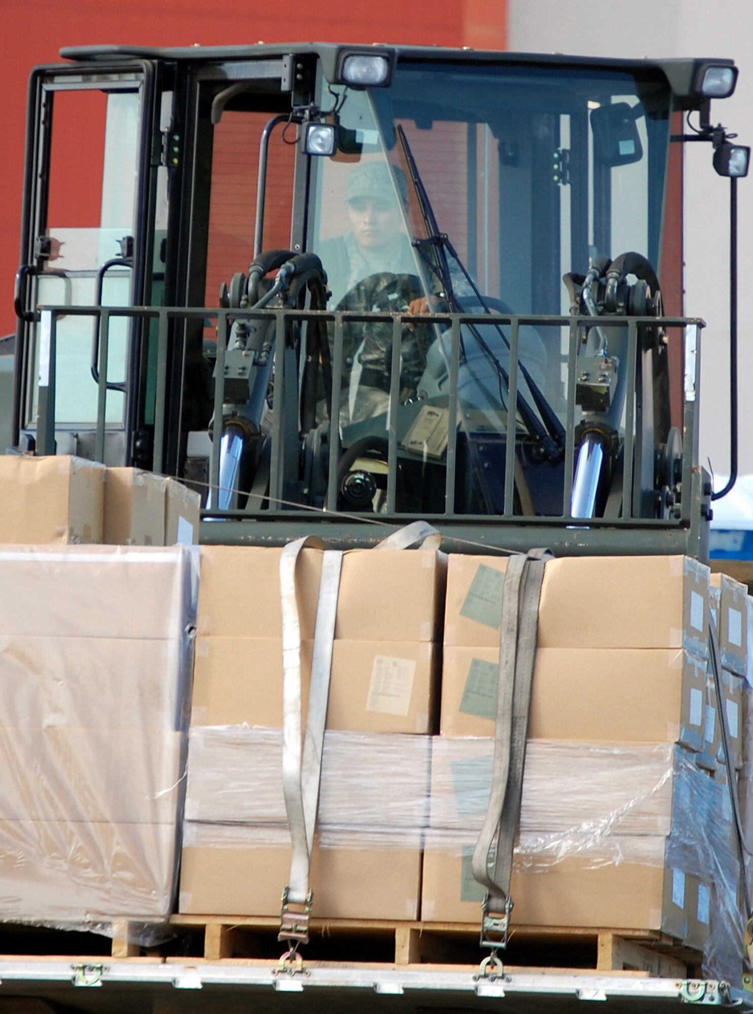 A student in Air Force Exercise Eagle Flag 08-6 uses an extreme terrain forklift to move cargo as part of exercise operations Sept. 20, 2008, at Naval Air Engineering Station Lakehurst, N.J.  Eagle Flag is managed by the U.S. Air Force Expeditionary Center's 421st Combat Training Squadron at Fort Dix, N.J., and tests and trains Airmen in expeditionary combat support skills.  (U.S. Air Force Photo/Tech. Sgt. Scott T. Sturkol)