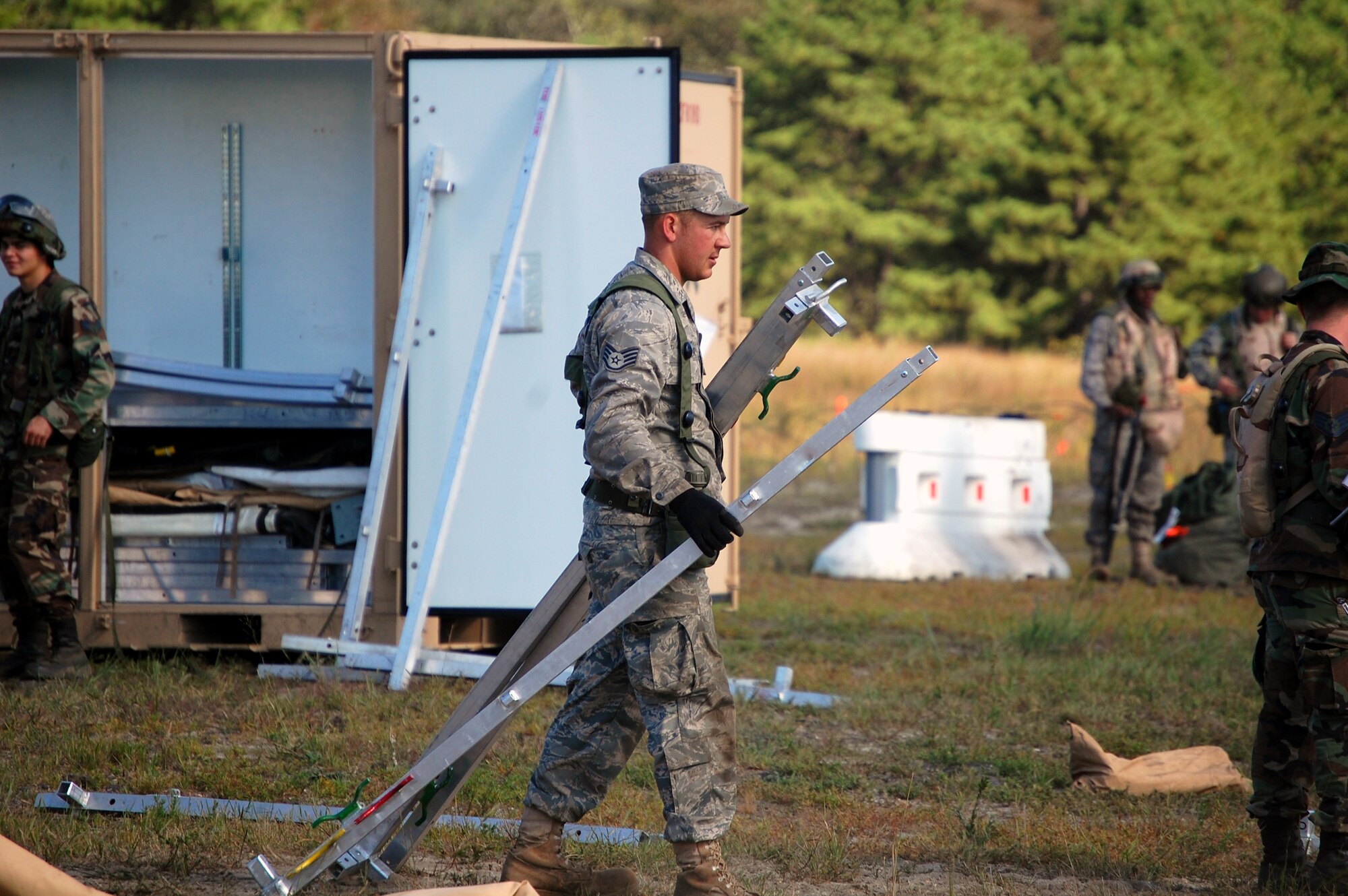 Students in Air Force Exercise Eagle Flag 08-6 build a tent as part of exercise operations Sept. 20, 2008, at Naval Air Engineering Station Lakehurst, N.J.  Eagle Flag is managed by the U.S. Air Force Expeditionary Center's 421st Combat Training Squadron at Fort Dix, N.J., and tests and trains Airmen in expeditionary combat support skills.  (U.S. Air Force Photo/Tech. Sgt. Scott T. Sturkol)