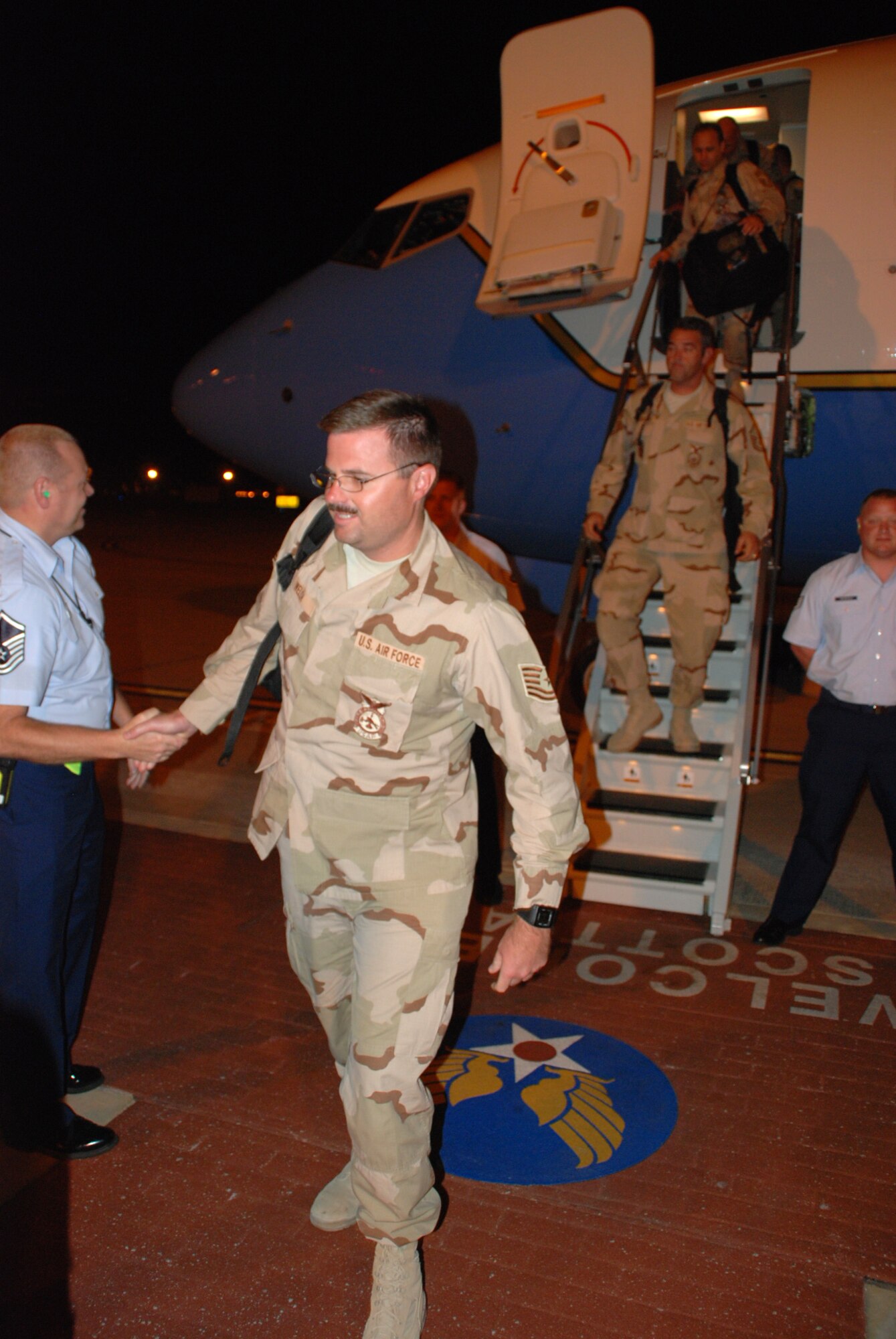 932nd Airlift Wing members return from an overseas deployment in September to touch down at Scott Air Force Base near Belleville, Ill.  The Air Force Reserve wing flies both the C-40C pictured here, and the C-9C.  (U.S. Air Force photo by Tech Sgt. Dan Oliver)