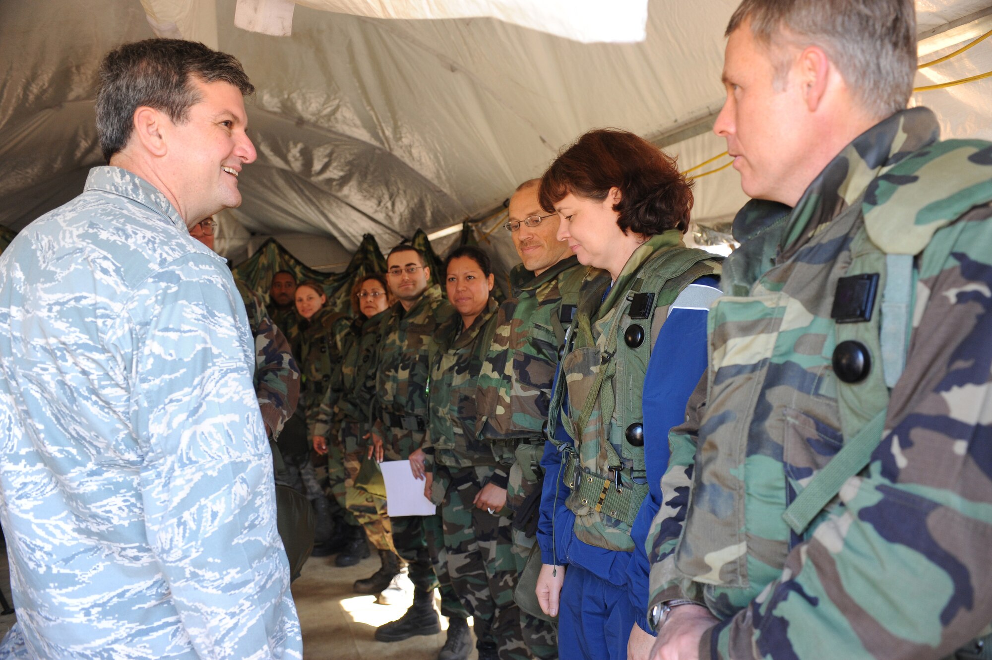 Lt. Gen. Vern "Rusty" Findley, Air Mobility Command vice commander, talks with Airmen from the 816th Contingency Response Group of McGuire Air Force Base, N.J., during a tour of Air Force Exercise Eagle Flag 08-6 Sept. 23, 2008, at Naval Air Engineering Station Lakehurst, N.J.  General Findley visited McGuire and the U.S. Air Force Expeditionary Center on Fort Dix, N.J., to learn more about expeditionary training and operations in both areas.  (U.S. Air Force Photo/Staff Sgt. Nathan Bevier)