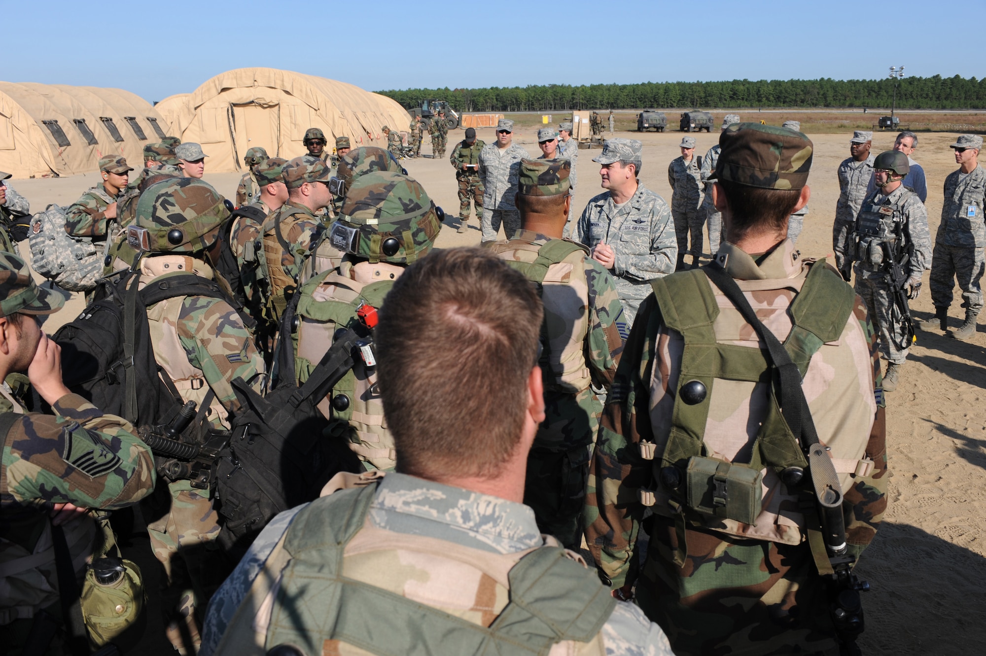 Lt. Gen. Vern "Rusty" Findley, Air Mobility Command vice commander, talks with Airmen from the 816th Contingency Response Group of McGuire Air Force Base, N.J., during a tour of Air Force Exercise Eagle Flag 08-6 Sept. 23, 2008, at Naval Air Engineering Station Lakehurst, N.J.  General Findley visited McGuire and the U.S. Air Force Expeditionary Center on Fort Dix, N.J., to learn more about expeditionary training and operations in both areas.  (U.S. Air Force Photo/Staff Sgt. Nathan Bevier)
