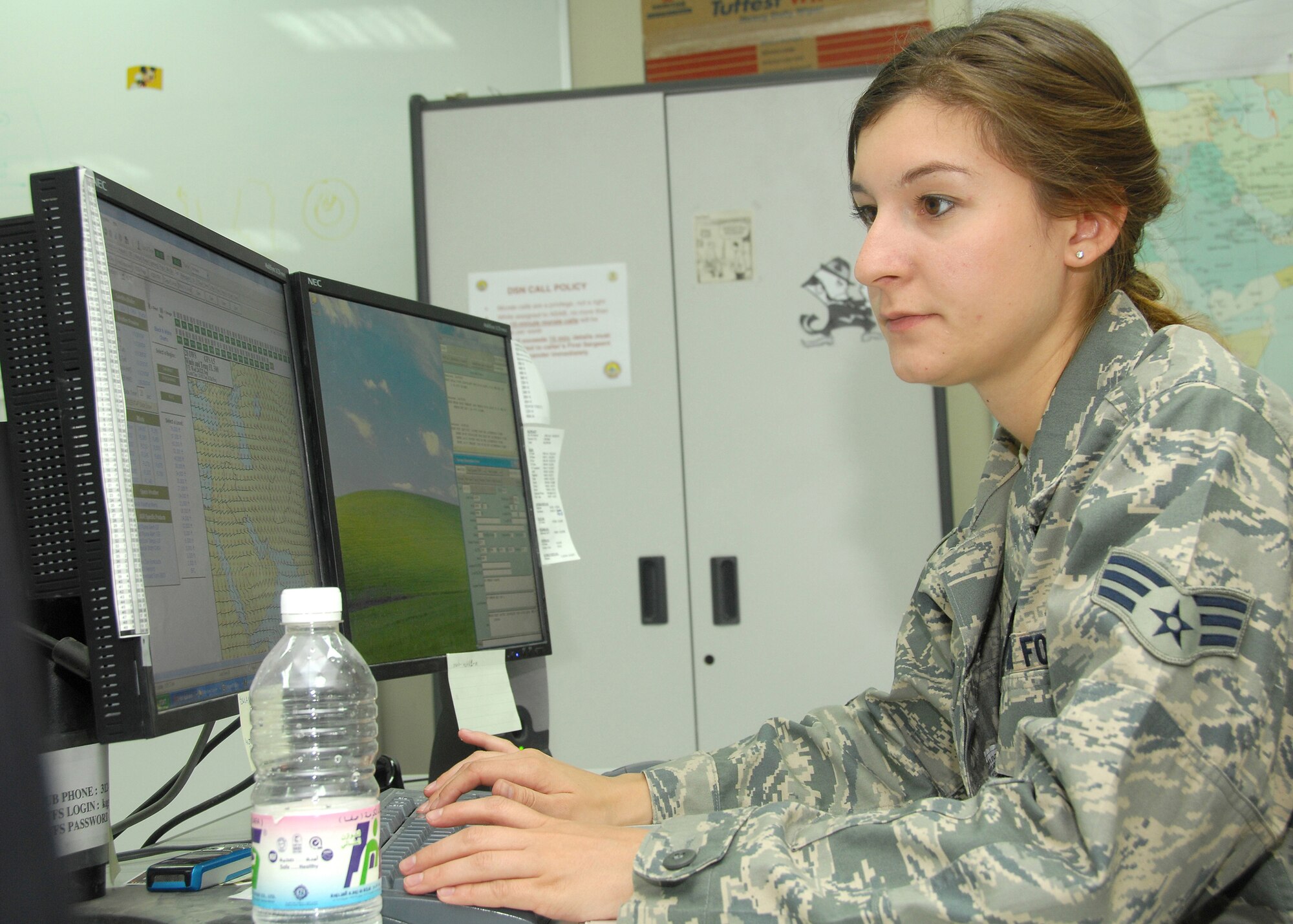 SOUTHWEST ASIA -- Senior Airman Eryn Morales, a weather forecaster assigned to the 386th Expeditionary Operations Support Squadron, checks the flight level winds over Iraq on Sept. 24 at an air base in Southwest Asia. The Weather flight provides accurate weather information to protect base assets including personnel, structures, equipment and the airfield from adverse weather conditions. Airman Morales is deployed from Aviano Air Base, Italy. (U.S. Air Force photo/Tech. Sgt. Raheem Moore)