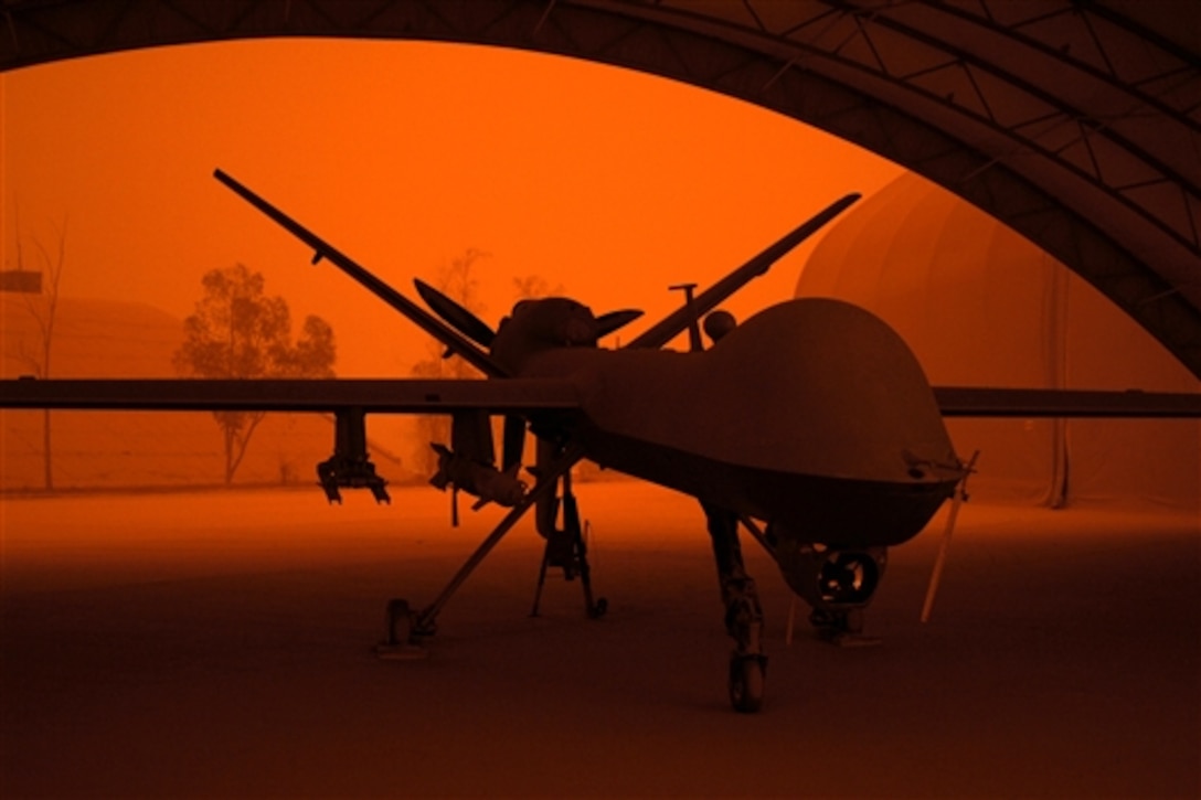 An MQ-9 Reaper sits in a hangar during a sandstorm at Joint Base Balad, Iraq, Sept. 15, 2008. 
