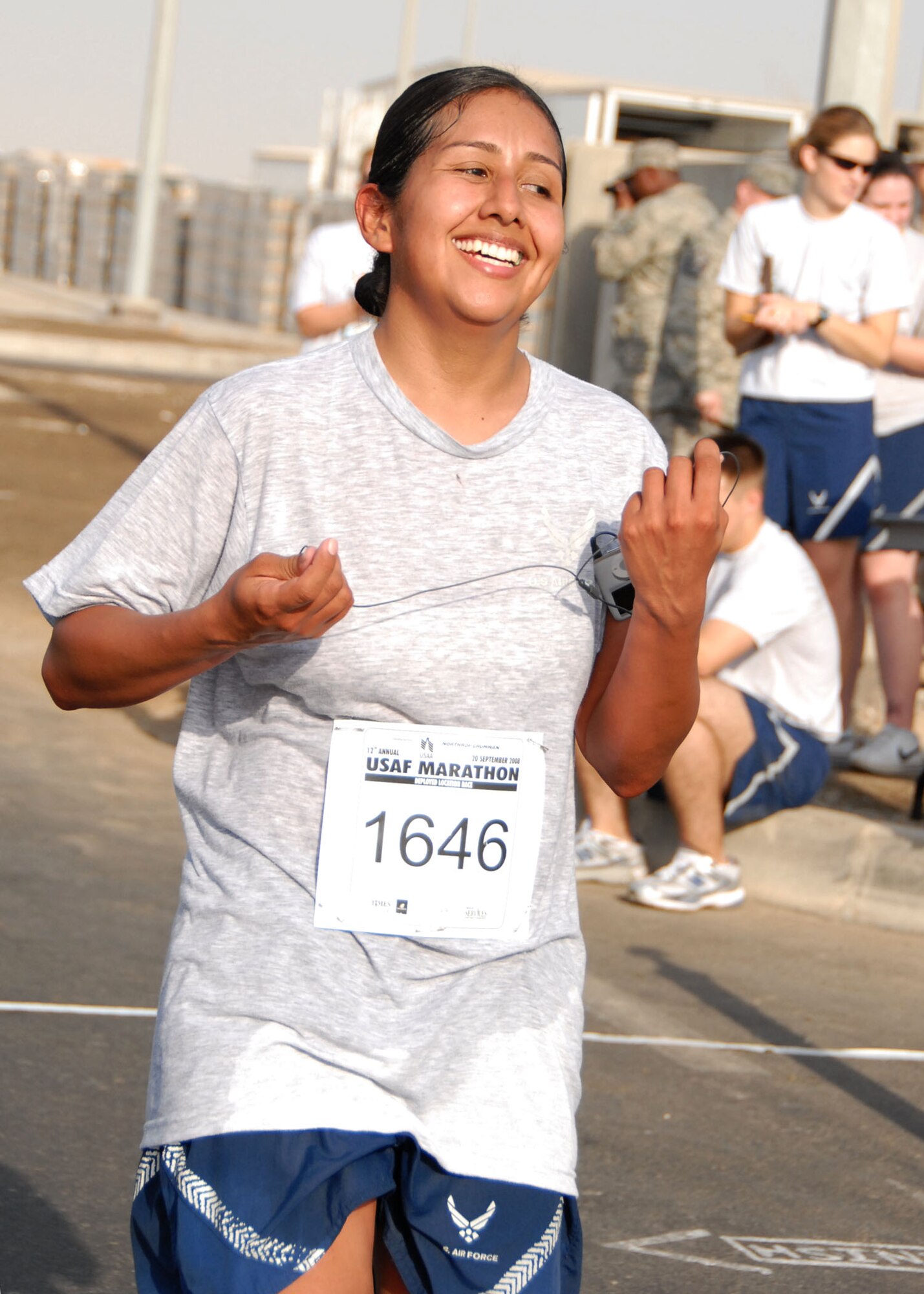 SOUTHWEST ASIA -- Tracy Howard was the first female finisher for the 13.1-mile "half-marathon" held at the 380th Air Expeditionary Wing today with a time of 2:00:40. The event is an official extension of the U.S. Air Force Marathon that was held at Wright-Patterson Air Force Base, Ohio, Sept. 20. Extensions of the marathon allow deployed Airmen to compete as long as they are registered and the event follows official rules. Extensions must be held within 10 days of the actual marathon. (U.S. Air Force photo/Tech. Sgt. Denise Johnson)(released)