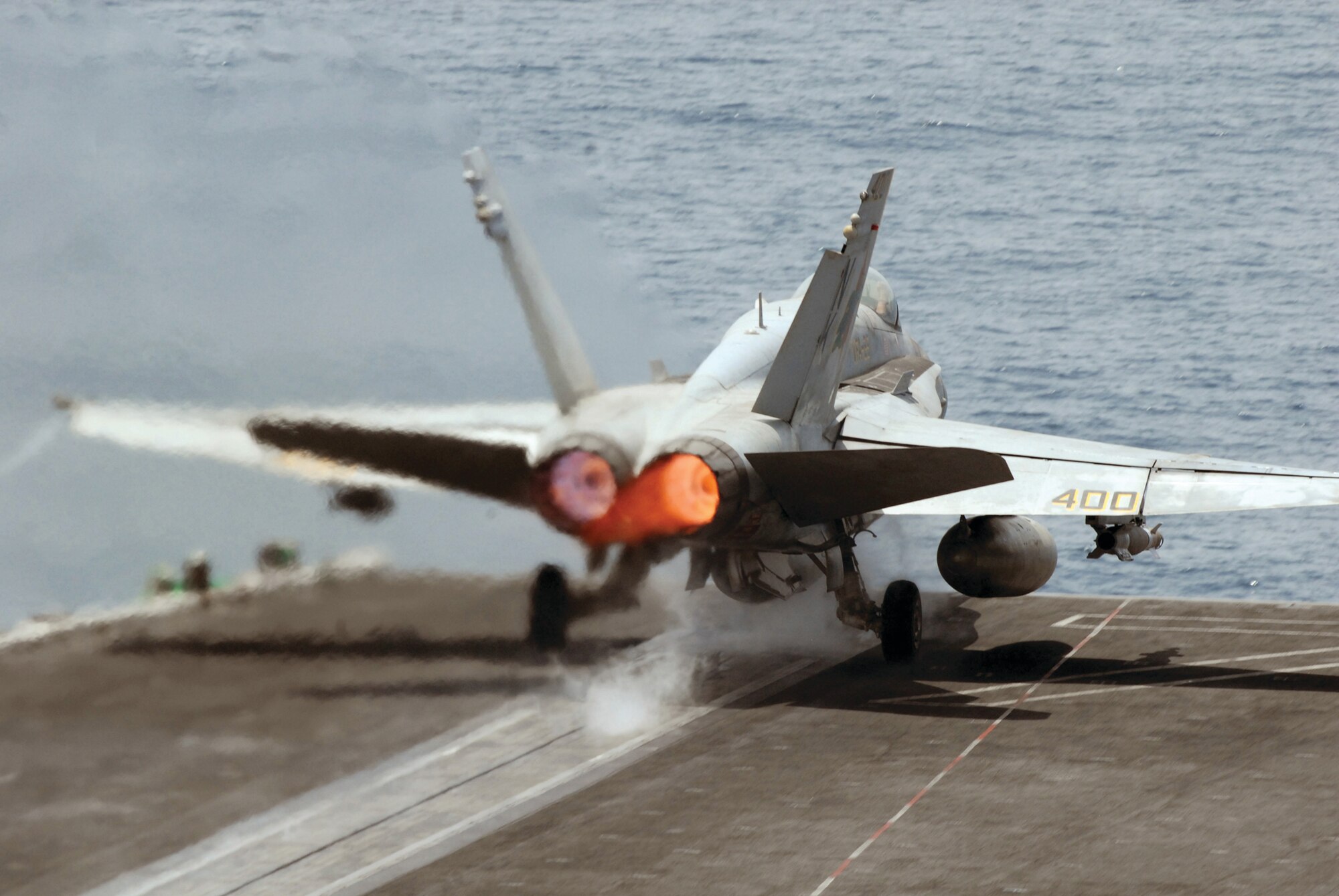 An F/A-18C Hornet from the “Fist of the Fleet” Strike Fighter Squadron 25 launches off catapult four recently. This launch was the last waist catapult launch of the last daylight cycle prior to the beginning of night operations. These F-18s typically require an average of three separate air refueling sessions, all accomplished by KC-135s assigned to the 379th Air Expeditionary Wing. The USS Ronald Reagan is currently deployed to the U.S. Naval Forces Central Command, U.S. Fifth Fleet, area of responsibility. Operations in the AOR are focused on reassuring regional partners of the United States’ commitment to security, which promotes stability and global prosperity. All of this is made possible by the continuous cooperation among sister services. (U.S. Navy photo by Petty Officer 3rd Class Gary Prill, Navy Visual News Service)