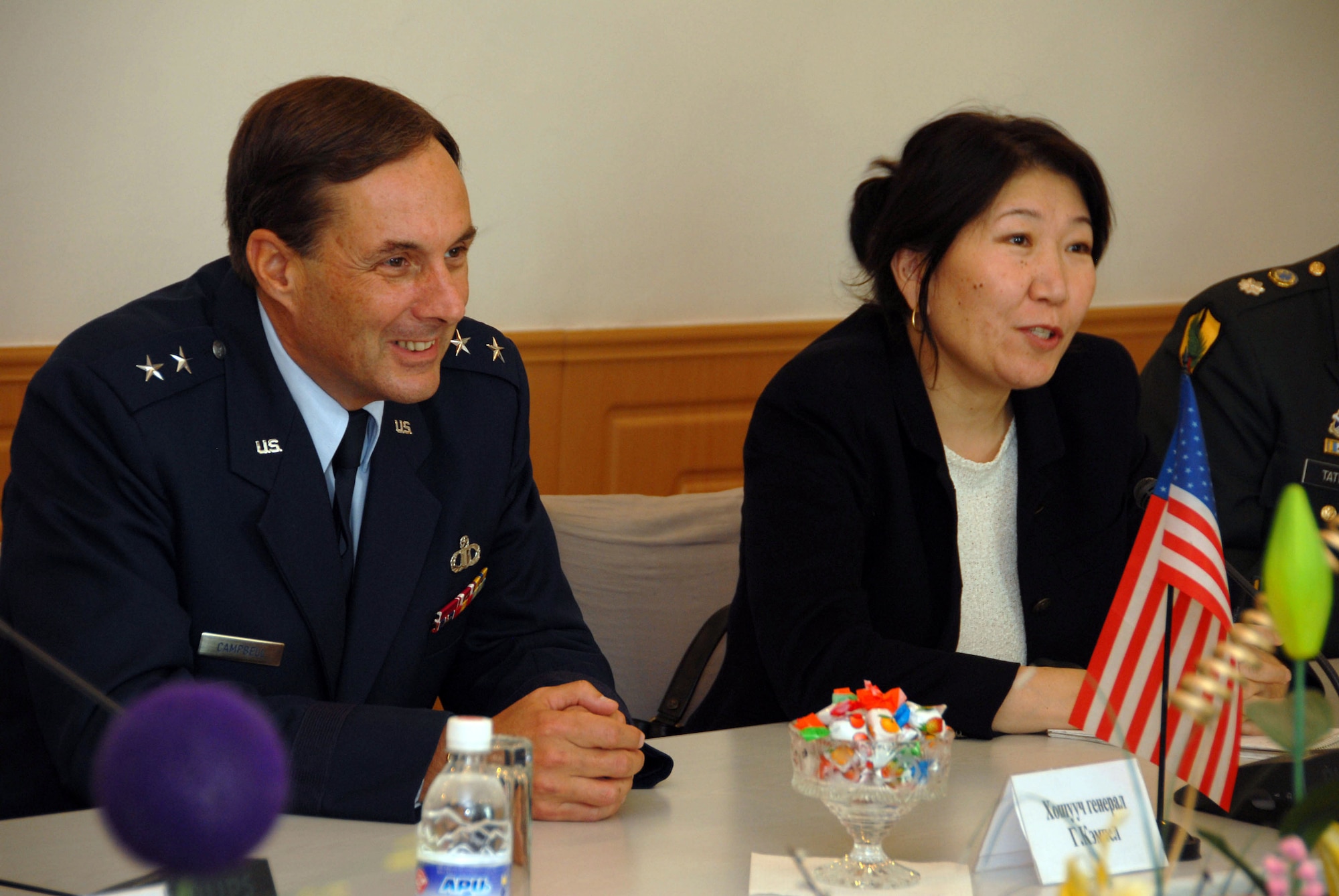 Lt. Gen. Craig Campbell, the adjutant general of the Alaska National Guard, waits as his translator, Mrs. Tsedka, conveys his words to Mongolia Armed Forces (MAF) Chief of General Staff Lt.Gen. Togoo, with his translator and staff. Alaska Air National Guard photo by Master Sgt. Jules Barklow.
