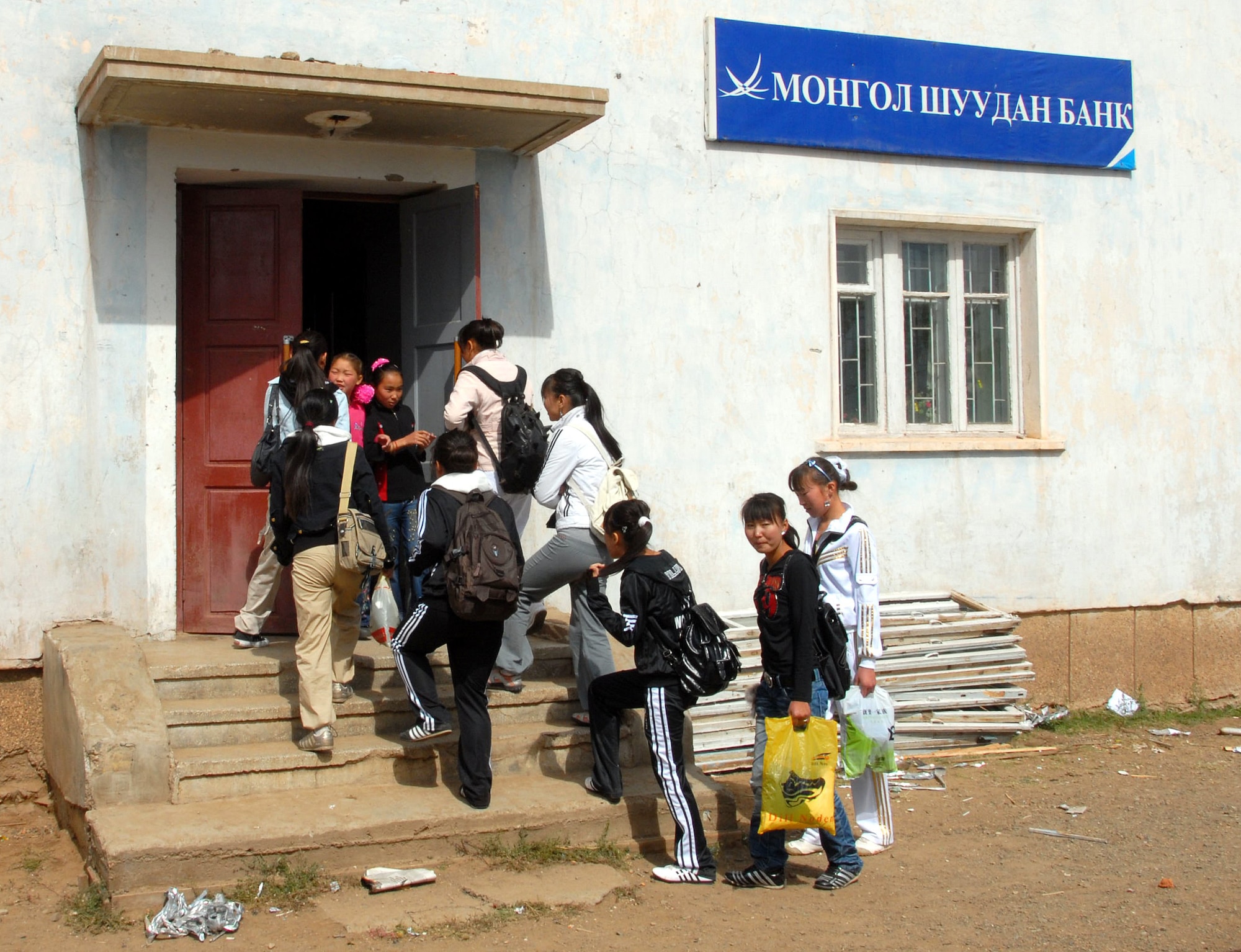 Mongolian children from Alton Bulaag enter the lower level of their school dormatory. Members of the 871st Engineering Battalion, Wailuku, Hawaii, are there performing renovations during Khaan Quest 2008 conducted on Camp Five Hills.
US Air Force Photo by Master Sergeant Jules Barklow