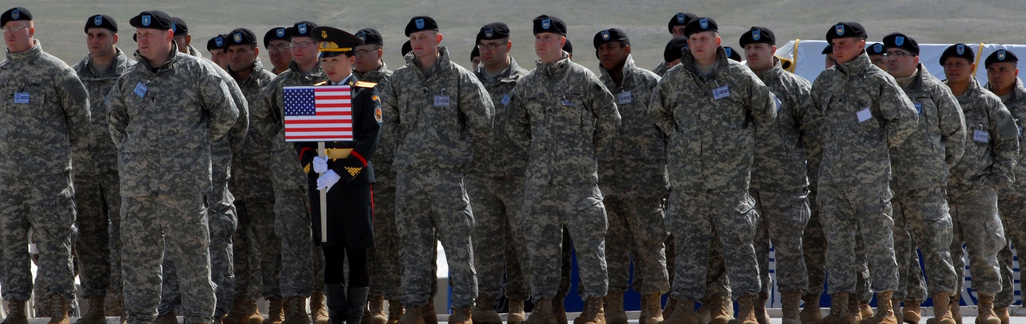 An Alaska Army National Guard contingent and their Mongolian guide during the opening ceremony for Khaan Quest 2008 at Camp Five Hills, Mongolia, on Sept. 3, 2008. Alaska Air National Guard photo by MSgt. Julia Barklow.