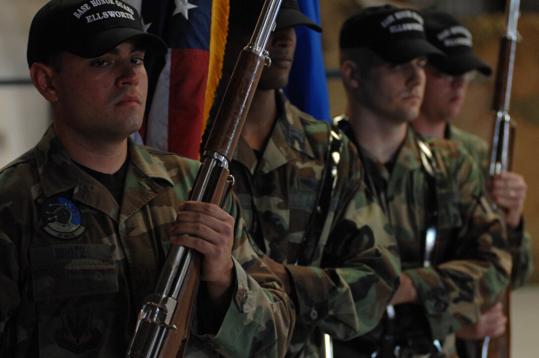 Ellsworth Honor Guard members post during the honor guard's open house here, Sept. 25. The open house showcased skills of the Ellsworth Honor Guard team. (U.S. Air Force photo by Airman Corey Hook)


