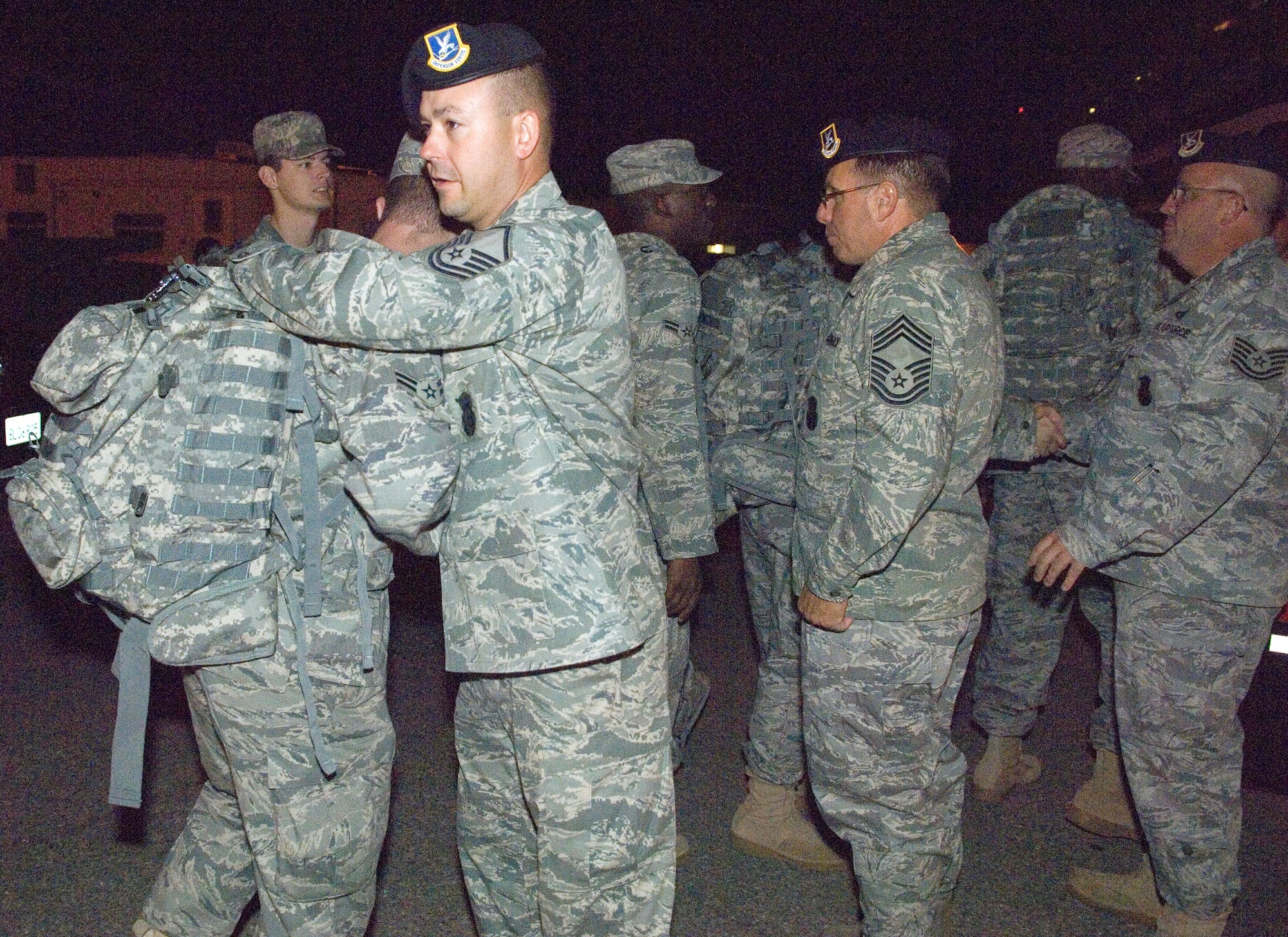 Leadership from the 95th Security Forces Squadron bid goodbye Sept. 23 to 28 deploying Airmen. While deployed, the Airmen will perform security operations for Ali Air Base, Iraq. (Air Force photo by Mike Cassidy)