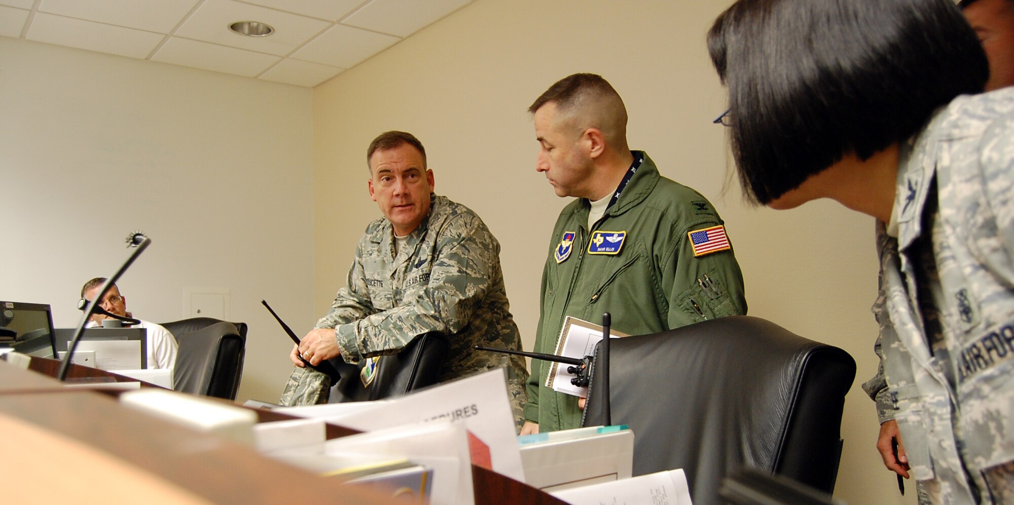LAUGHLIN AIR FORCE BASE, Texas – Col. John Doucette, 47th Flying Training Wing commander, consults with other commanders from within the wing in the Emergency Operations Center here Sept. 24.  Laughlin’s state-of-the-art EOC acts as a central command location for any large-scale event taking place on base in which quick, clear communication among a variety of key agencies is essential.  (U.S. Air Force photo by Staff Sgt Austin M. May)