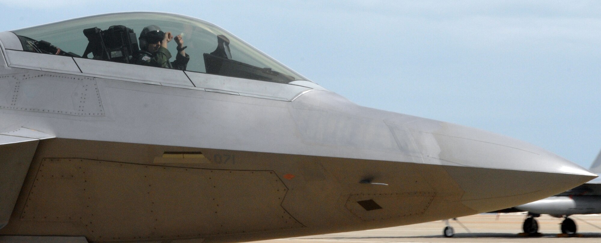 LANGLEY AIR FORCE BASE, Va. – An F-22A pilot from the 94th Fighter Squadron returns to Langley after training at Combat Archer Sept. 27.  Combat Archer, held at Tyndall Air Force Base, Fla.,  is an air-to-air weapons system evaluation program that allows pilots to test the reliability and effectiveness data of aircraft and missiles.  (U.S. Air Force photo/Airman 1st Class Zachary Wolf)