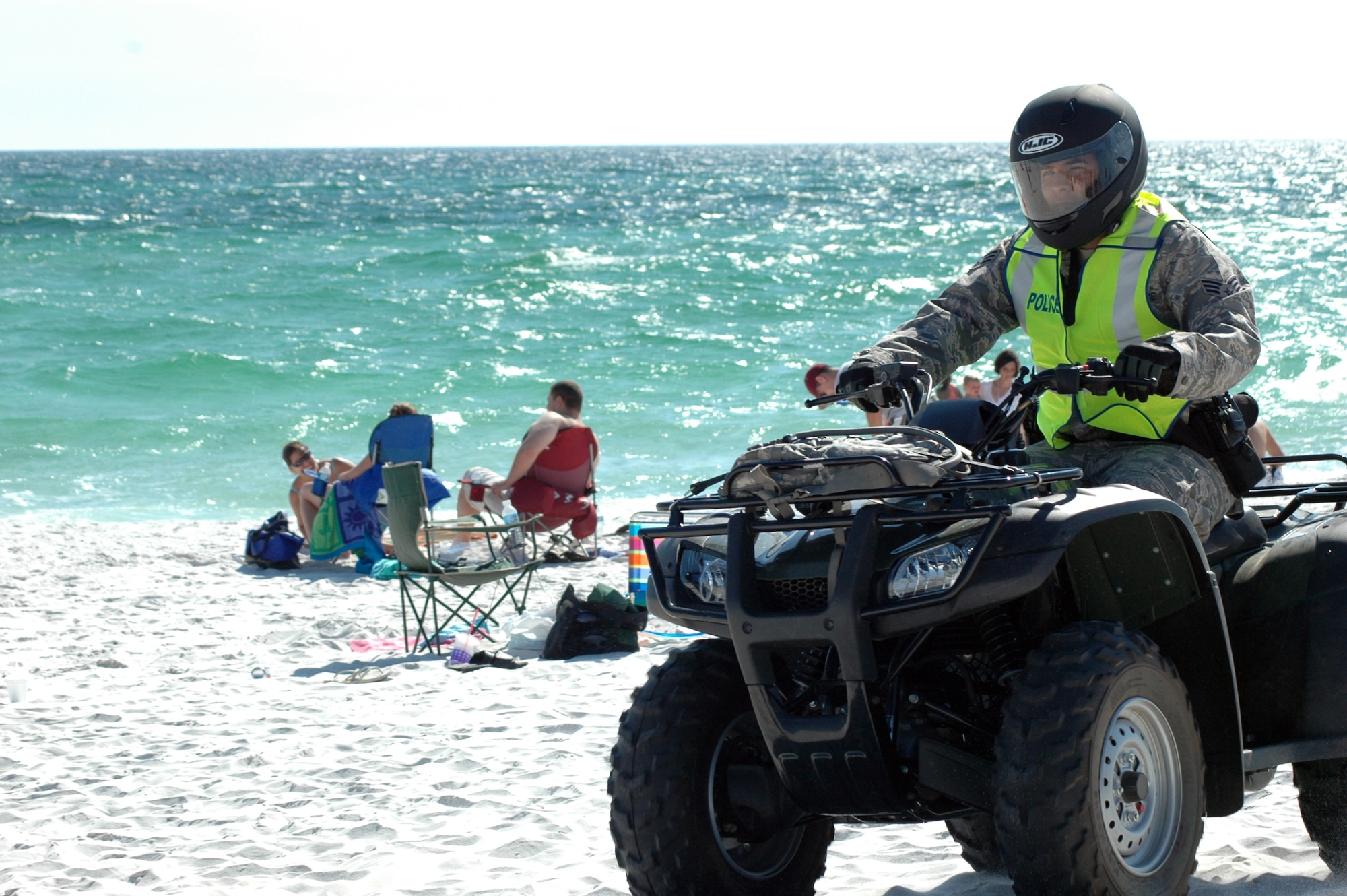 EGLIN AIR FORCE BASE, Fla. -- 96th Security Forces patrol the area during the Beach Bash hosted at Beach Park on Okaloosa Island Sept. 26. The event was an afternoon of fun designed to promote team building, unit morale and celebrate the end of 101 days of a safe summer. (US Air Force photo/ Airman 1st Class Anthony Jennings)