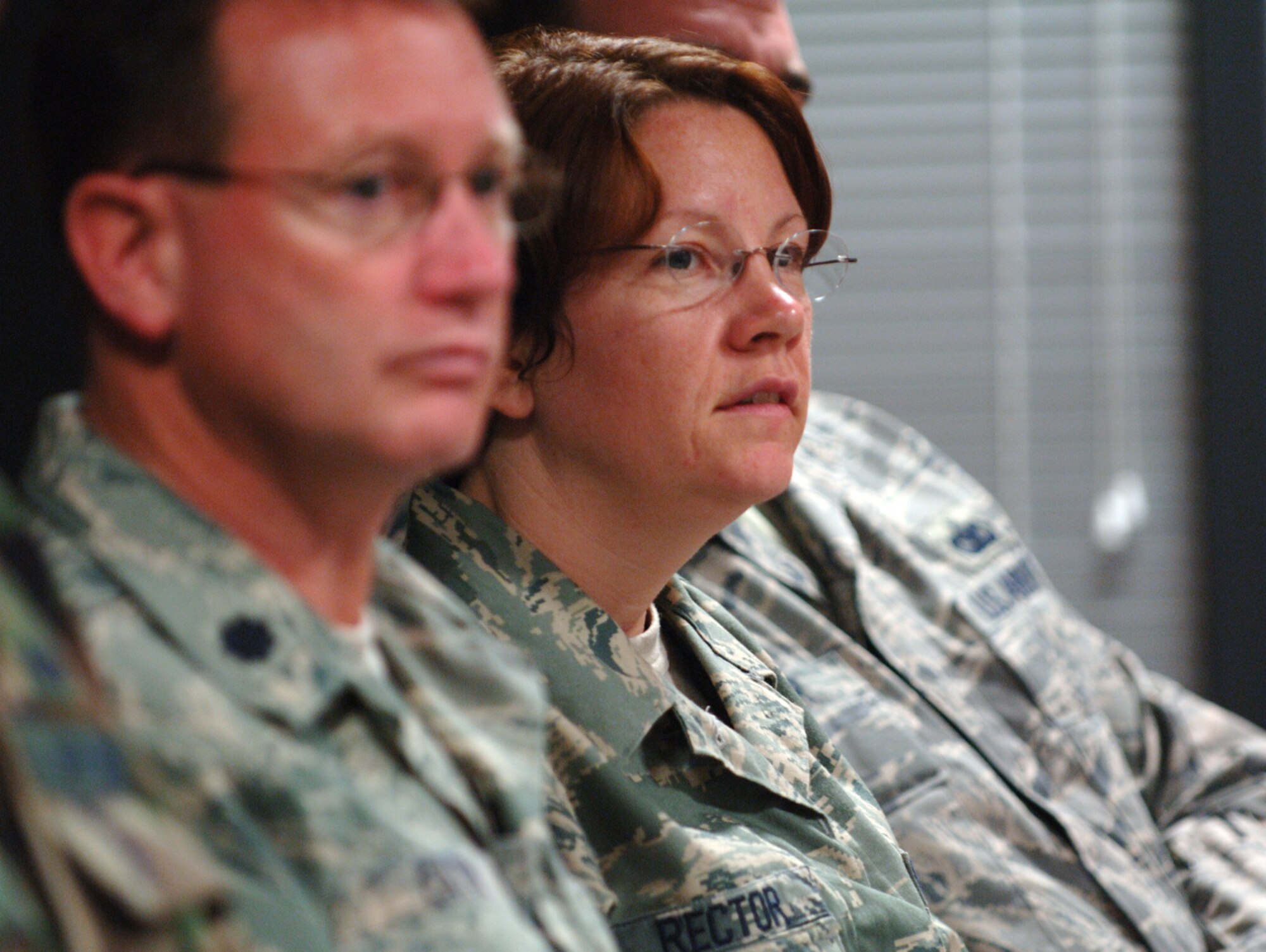 Staff Sgt. Regina Rector listens to a staff meeting discussion at the headquarters of the 931st Air Refueling Group.  Sergeant Rector is the Group's new Superintendent of Safety.