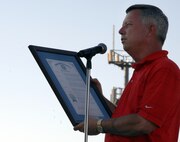 OMAHA, Neb. -- Dave Heineman, Neb. governor, reads the proclamation declaring Omaha as one of the 2008 Air Force Week location to the crowd Aug. 9 during opening ceremonies. Opening ceremonies included performances by the Heartland of America Band and Jessica Andrews and a fireworks display. (Courtesy of 55th Wing Public Affairs)