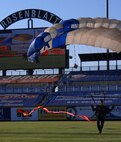 OMAHA, Neb. -- An U.S. Air Force Academy Wings of Blue Jump Team member lands in Rosenblatt Stadium Aug. 9 as part of Air Force Week in the Heartland Opening Ceremonies. Opening ceremonies included performances by the Heartland of America Band and Jessica Andrews and a fireworks display. (Courtesy of 55th Wing Public Affairs)