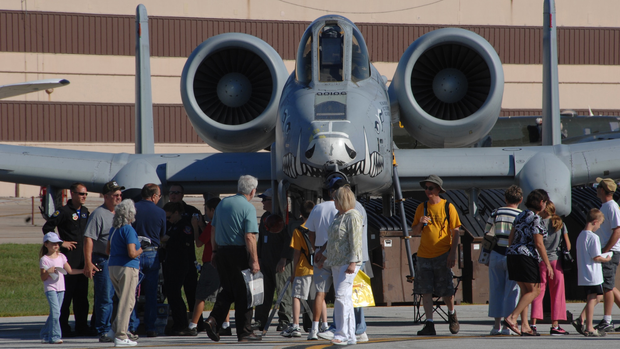 OFFUTT AIR FORCE BASE, Neb. -- Attendees admire the Air Force's A-10 Thunderbolt “Warthog” during this year's Offutt Defenders of Freedom Open House and Air Show Aug. 16. The Open House and Air Show was a two-day event ending Air Force Week in the Heartland. (U.S. Air Force Photo By Josh Plueger)