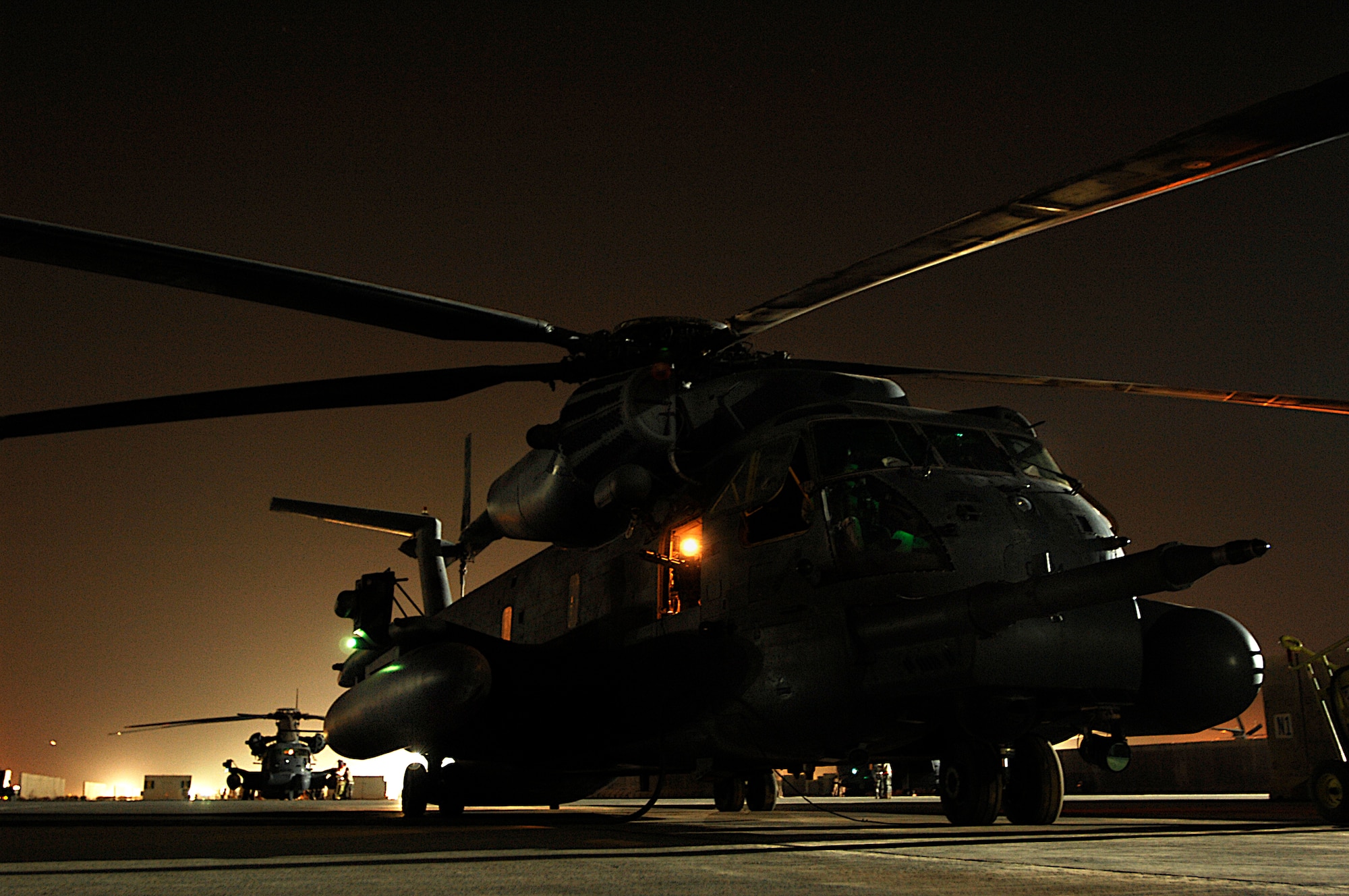 MH-53 Pave Low helicopters prepare to take off for their final combat mission Sept. 27. The MH-53s' mission was to supply special operations forces in support of Operation Iraqi Freedom. The MH-53, which is scheduled to retire from the Air Force inventory Sept. 30, was the largest, most powerful and technologically advanced helicopter in the Air Force, with a service record dating back to the Vietnam War. (U.S. Air Force photo/Airman 1st Class Jason Epley)