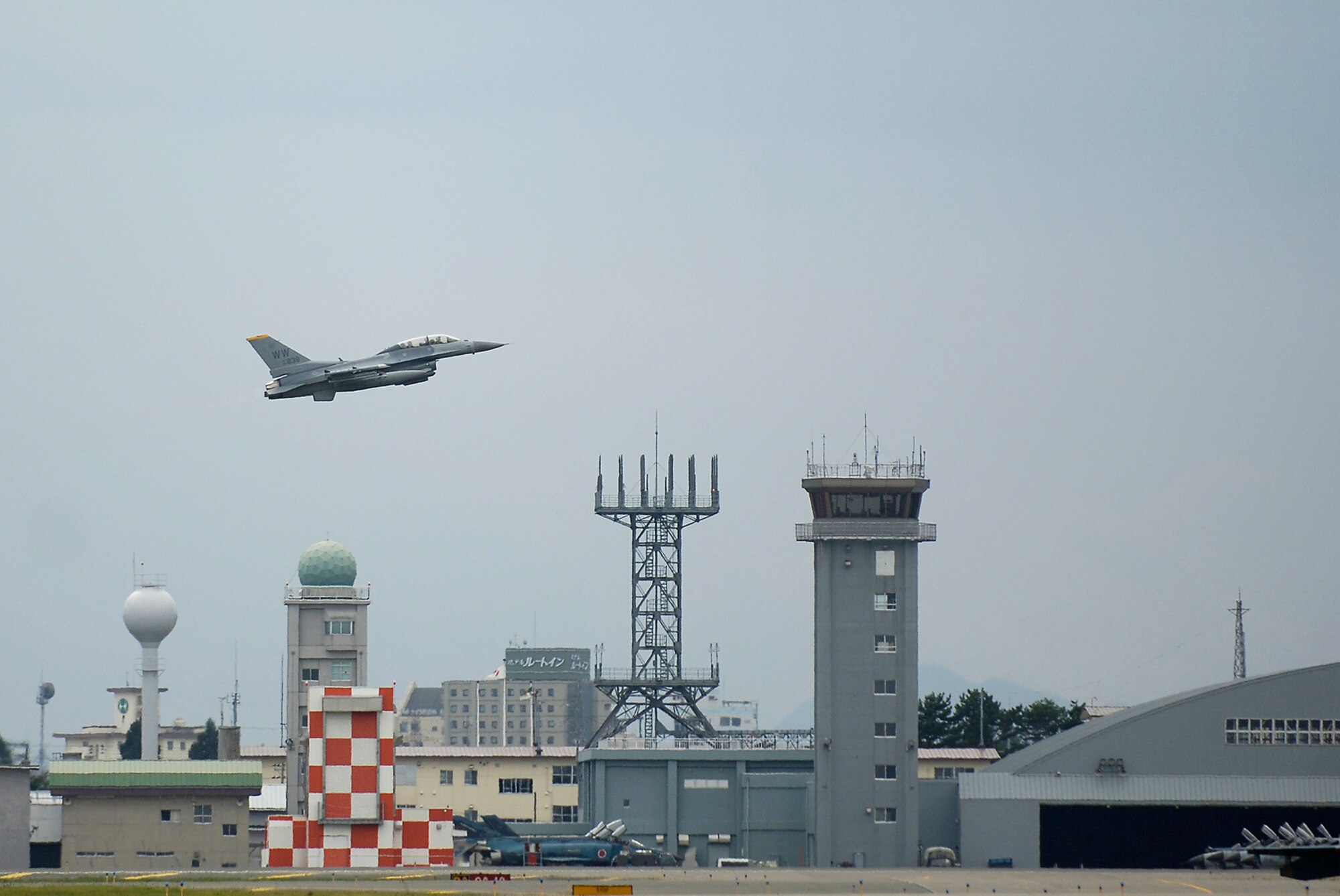 MISAWA AIR BASE, Japan -- Capt. Patrick McGarry, 13th Fighter Squadron, takes off in an F-16CM with Gen. Carrol H. "Howie" Chandler, Pacific Air Forces commander, as his passenger Sept. 26, 2008. General Chandler spoke about manning cuts, budget dollars, and how PACAF plans to ensure both training and quality of life initiatives are met in the upcoming fiscal year. (U.S. Air Force photo by Senior Airman Chad Strohmeyer)
