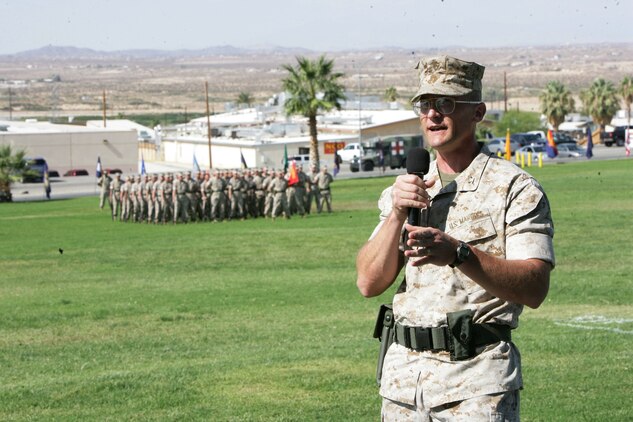 Col. Randall P. Newman, commanding officer of 7th Marine Regiment, address friends, families, and fellow Marines after assuming the role of the regiment’s commanding officer at a change-of-command ceremony at the Combat Center’s Torrey L. Gray Field Sept. 30. Newman, a native of Economy, Ind., was commissioned a second lieutenant in December 1987 upon graduation from Purdue University. Newman is also a graduate of the Amphibious Warfare School, French War College, School of Advanced Warfighting and National War College.